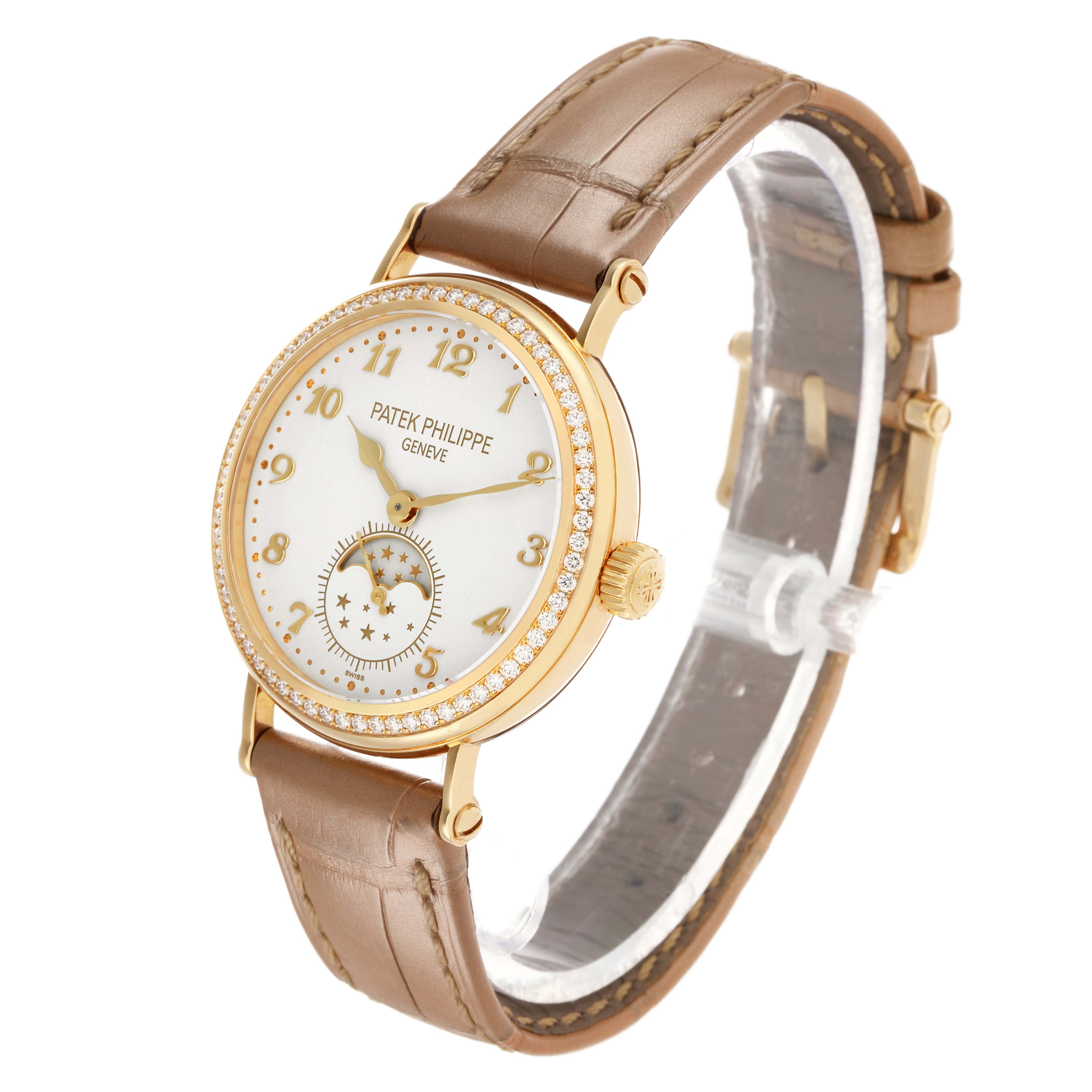 The Patek Philippe Calatrava 7121J-001 Women's Yellow Gold Silver Dial watch is shown at a three-quarter angle, highlighting the dial, bezel, and leather strap.