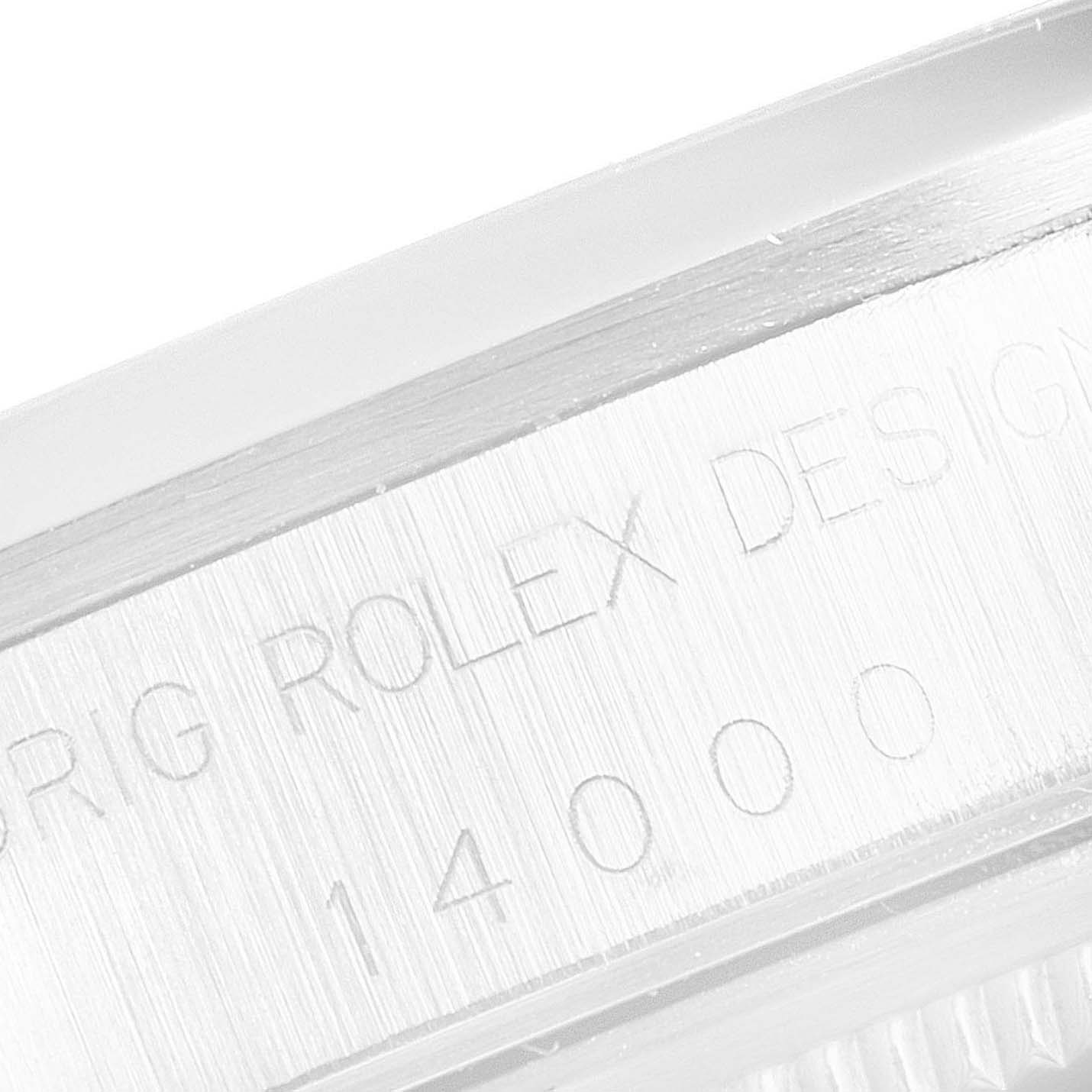 This image shows a close-up of the engraved model number and design details on the side of the Rolex Air-King 14000 Men's Stainless Steel Pink Dial 14000 Men's Stainless Steel Pink Dial watch case.