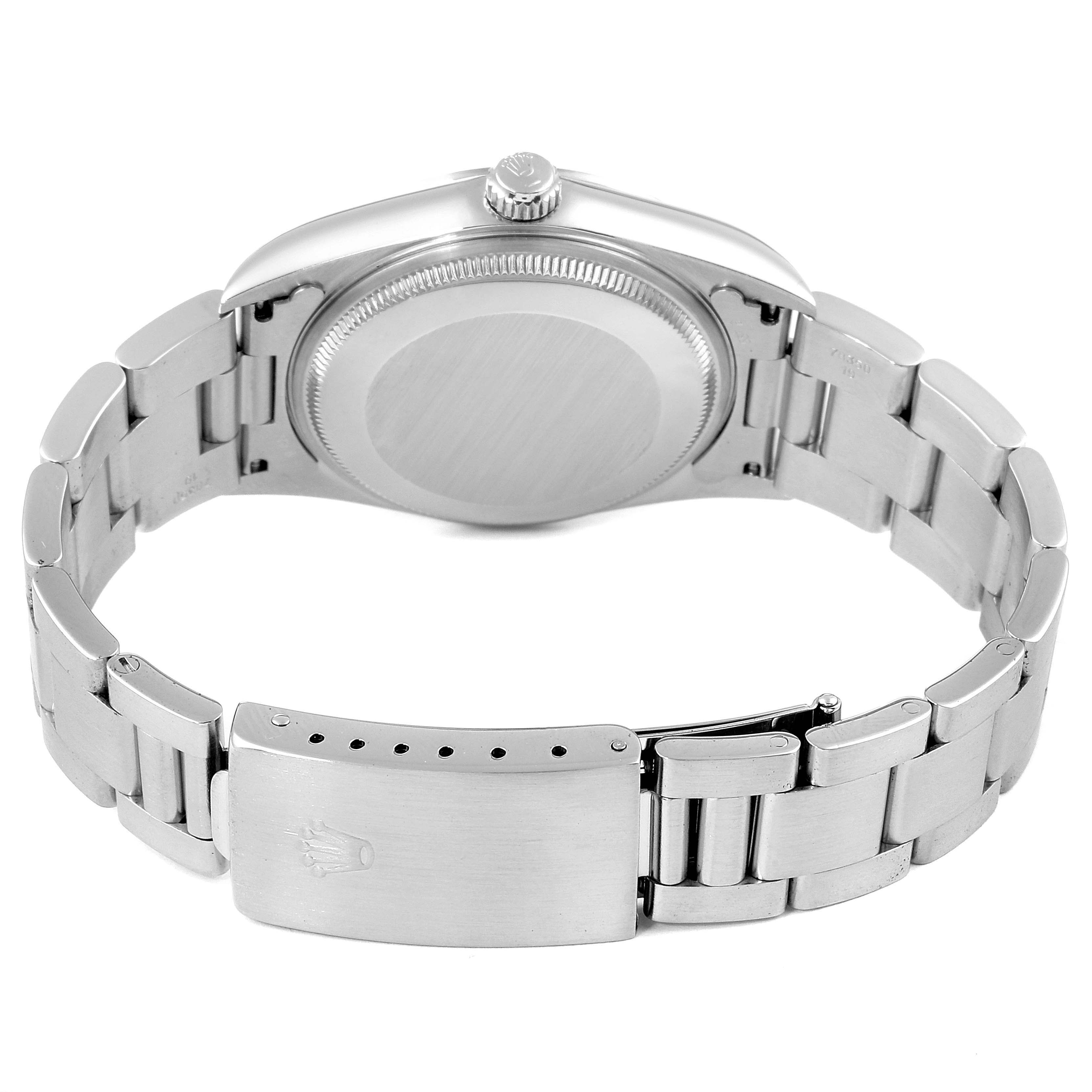 This image shows the back view of a Rolex Air-King 14000 Men's Stainless Steel Pink Dial 14000 Men's Stainless Steel Pink Dial, displaying the case back, bracelet, and clasp.