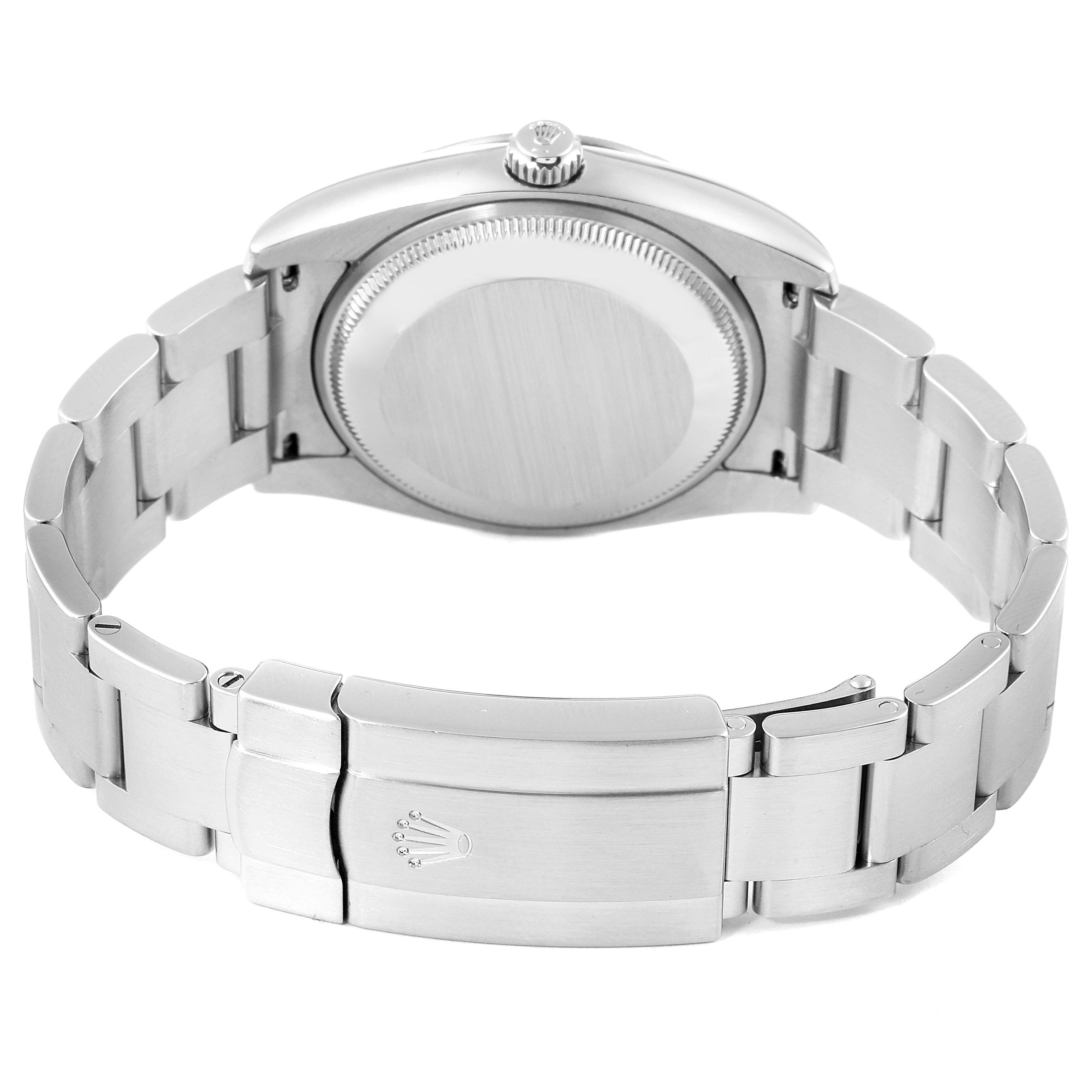 The image shows the back and bracelet clasp of a Rolex Air-King 114210 Men's Stainless Steel Blue Dial 114210 Men's Stainless Steel Blue Dial watch from a rear, slightly elevated angle.