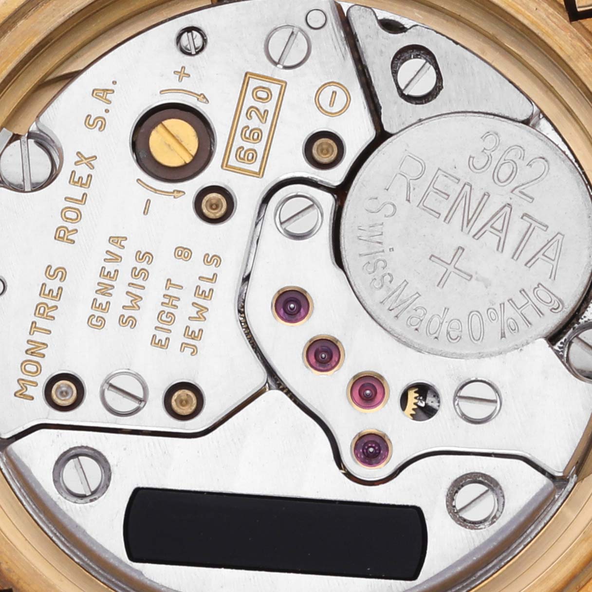 The image shows the internal mechanism of a Rolex Cellini 6621 Women's Yellow Gold White Dial 6621 Women's Yellow Gold White Dial watch, highlighting screws, jewels, and the battery.