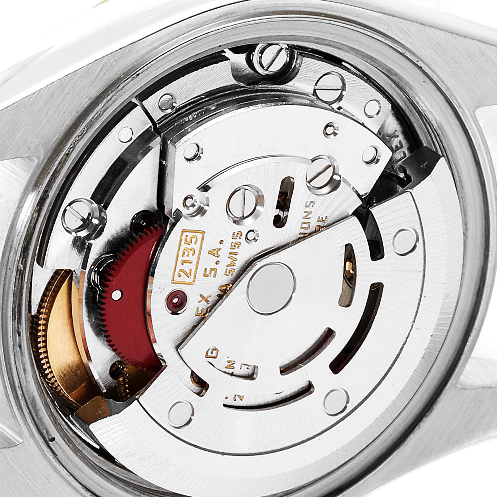 This is a close-up view of the movement components inside a Rolex Datejust 69173 Women
s Steel and Gold (two tone) Champagne Dial 69173 Women
s Steel and Gold (two tone) Champagne Dial watch.