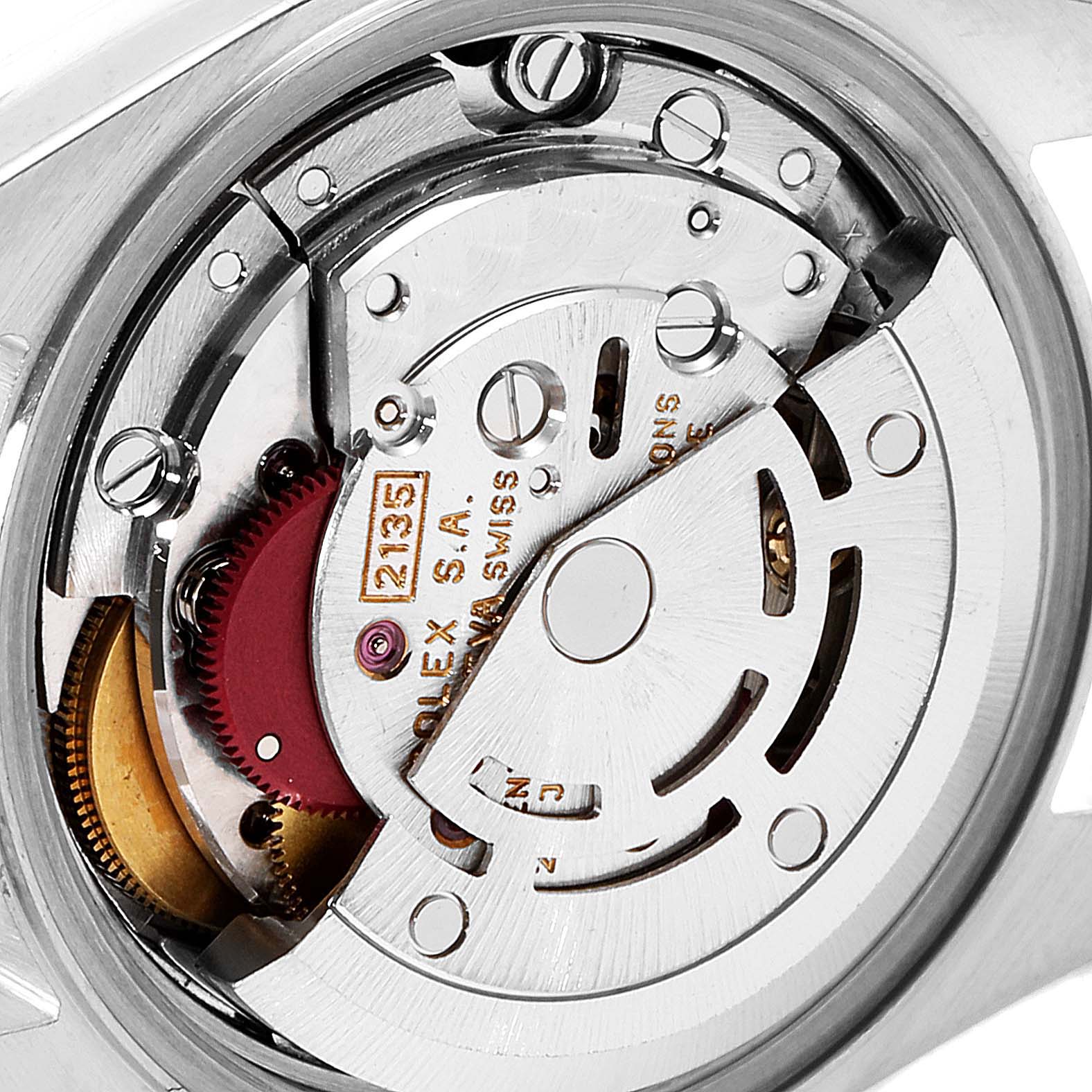 This image shows the movement mechanism of the Rolex Datejust 69173 Women's Steel and Gold (two tone) Champagne Dial 69173 Women's Steel and Gold (two tone) Champagne Dial watch from a back angle, revealing internal components.