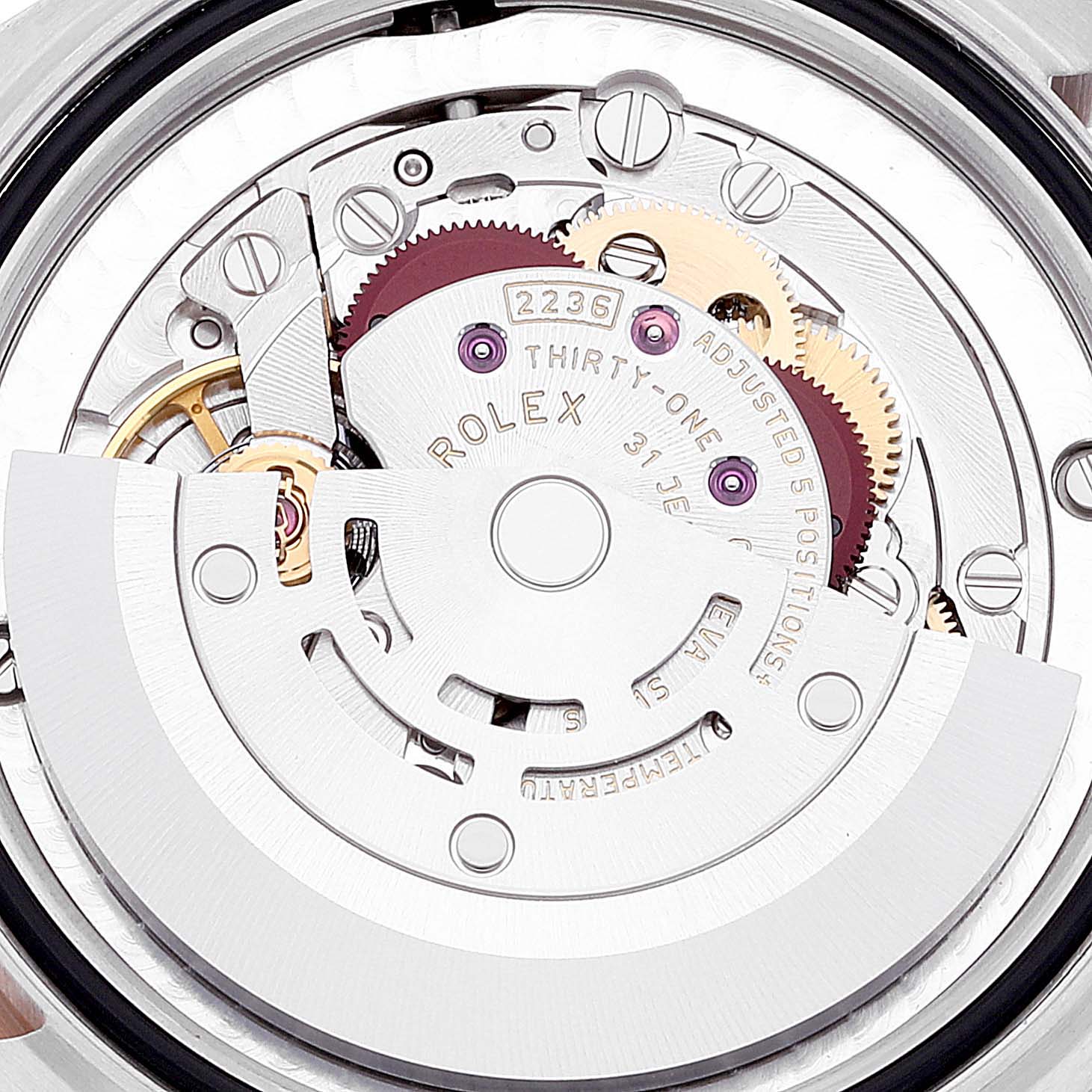 This image shows the intricate internal mechanism of a Rolex Mid-Size 278241 Women's Steel and Gold (two tone) Pink Dial 278241 Women's Steel and Gold (two tone) Pink Dial model watch, viewed from the back.