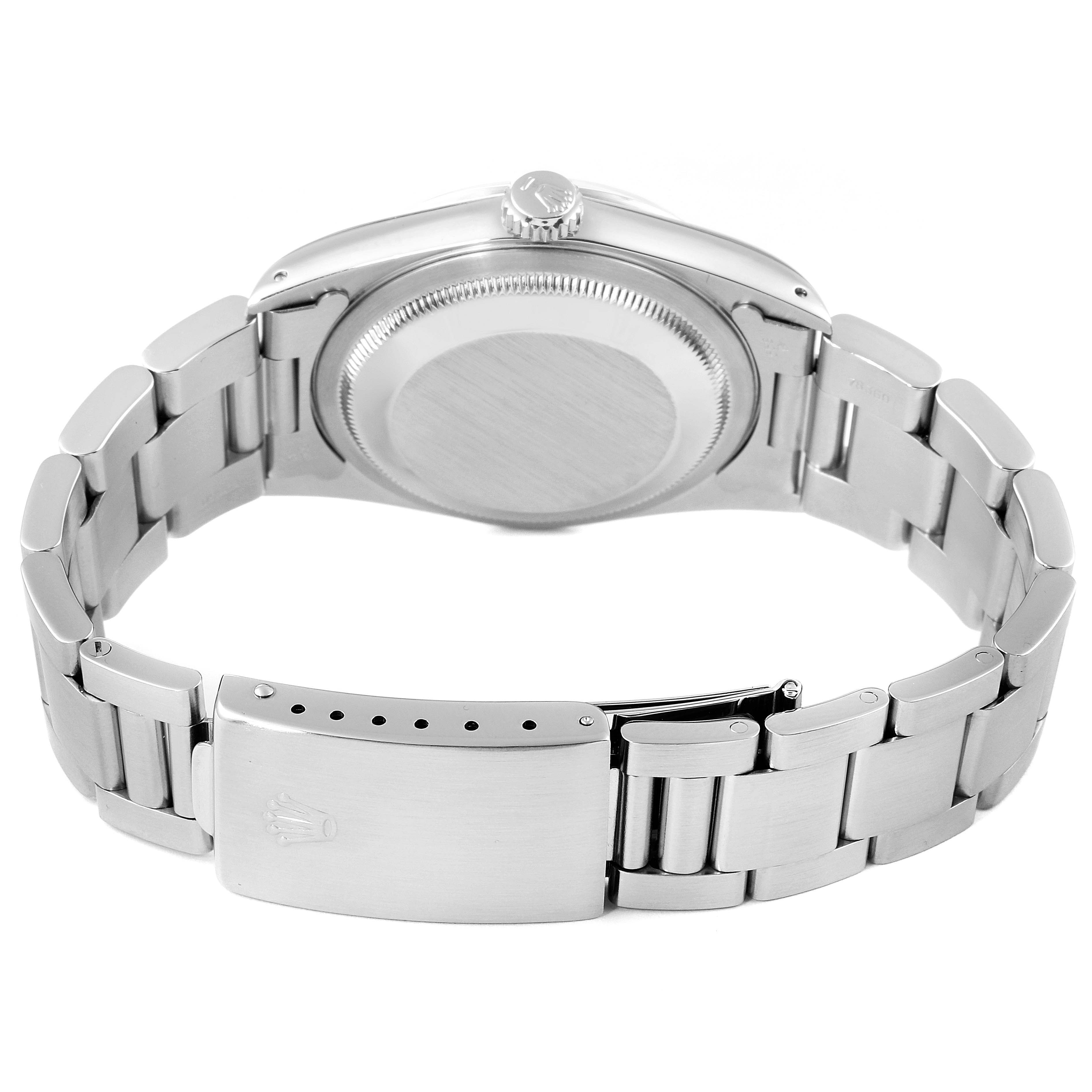 The image showcases the back of the Rolex Datejust 16200 Men's Stainless Steel Silver Dial 16200 Men's Stainless Steel Silver Dial watch, focusing on the case back and metal bracelet with the clasp.