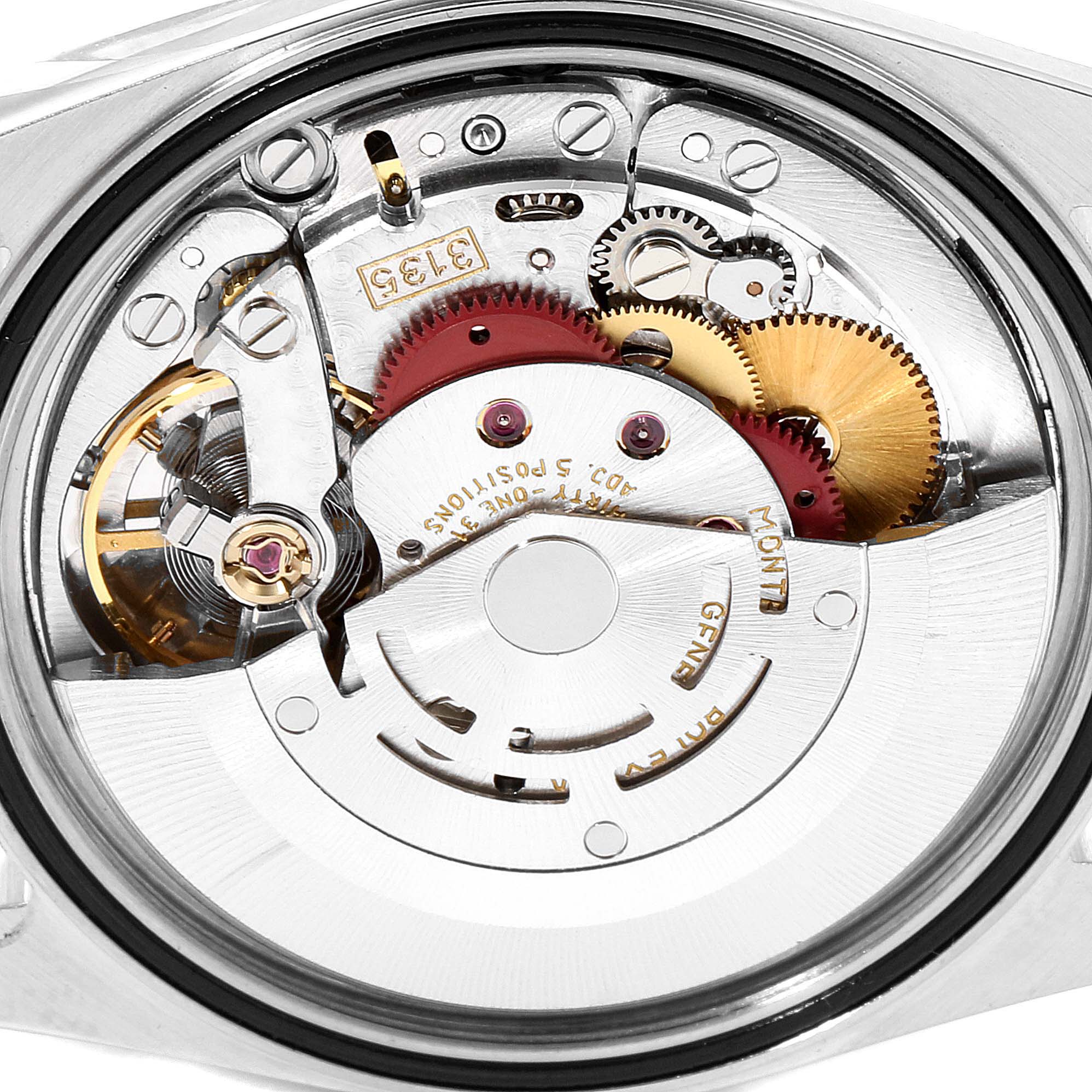 The image shows a close-up of the movement and internal mechanics of a Rolex Datejust 16200 Men's Stainless Steel Silver Dial 16200 Men's Stainless Steel Silver Dial watch.