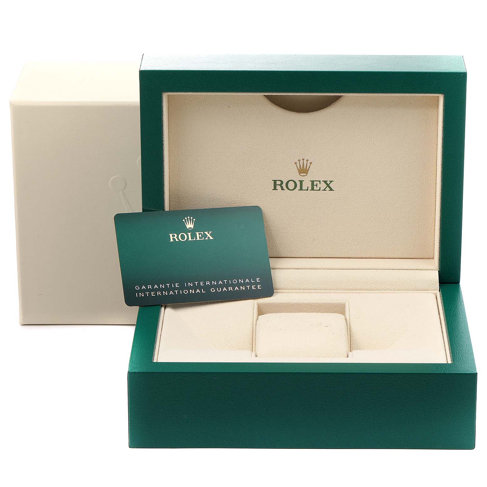 The image shows an open Rolex Datejust 116139 Men
s White Gold Silver Dial 116139 Men
s White Gold Silver Dial box with the international guarantee card partially inside the box.