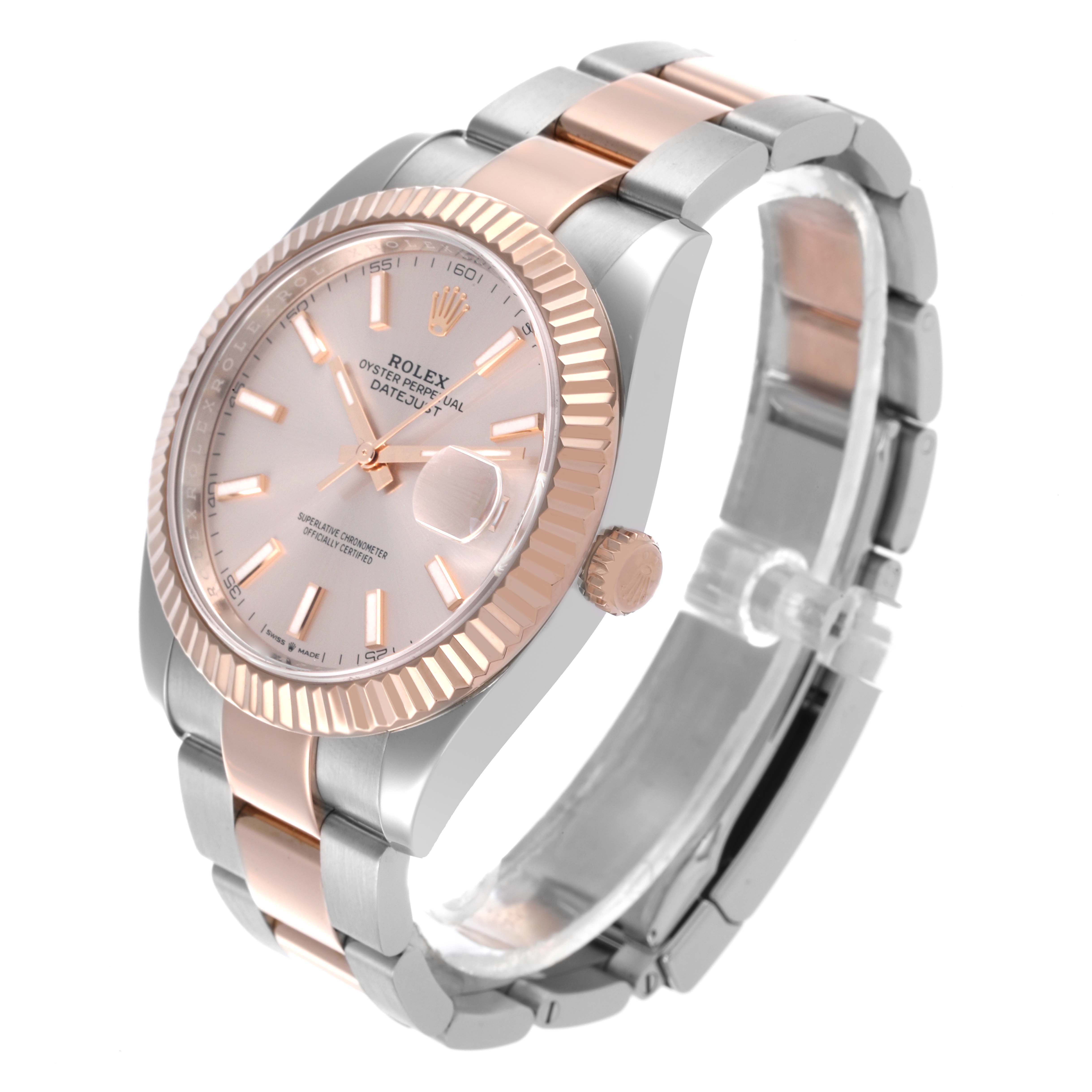 The Rolex Datejust 41 126331 Men's Steel and Gold (two tone) Pink Dial 126331 Men's Steel and Gold (two tone) Pink Dial is shown at an angle displaying the dial, fluted bezel, crown, and two-tone Oyster bracelet.