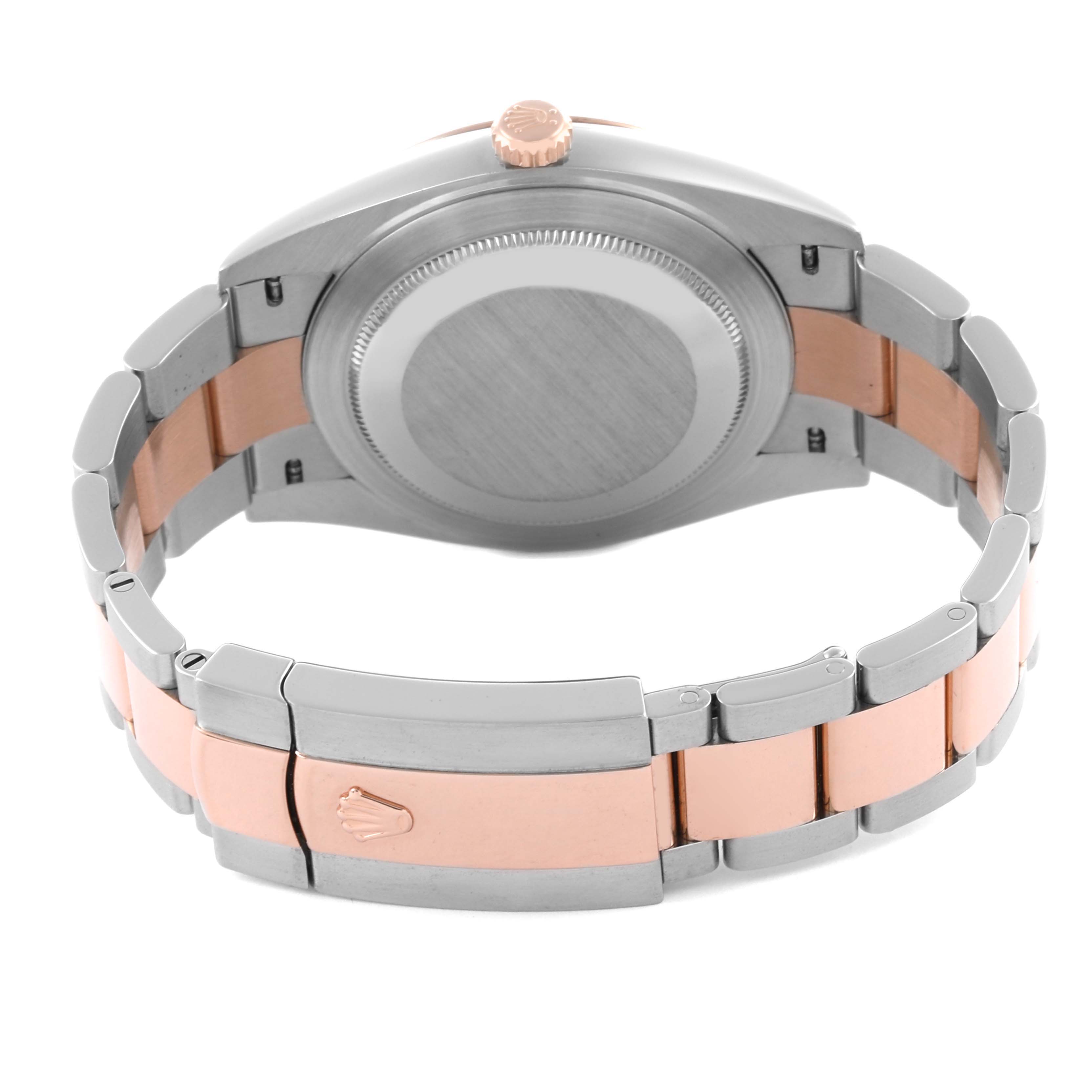 The image shows the back view of the Rolex Datejust 41 126331 Men's Steel and Gold (two tone) Pink Dial 126331 Men's Steel and Gold (two tone) Pink Dial, highlighting the case back and bracelet.