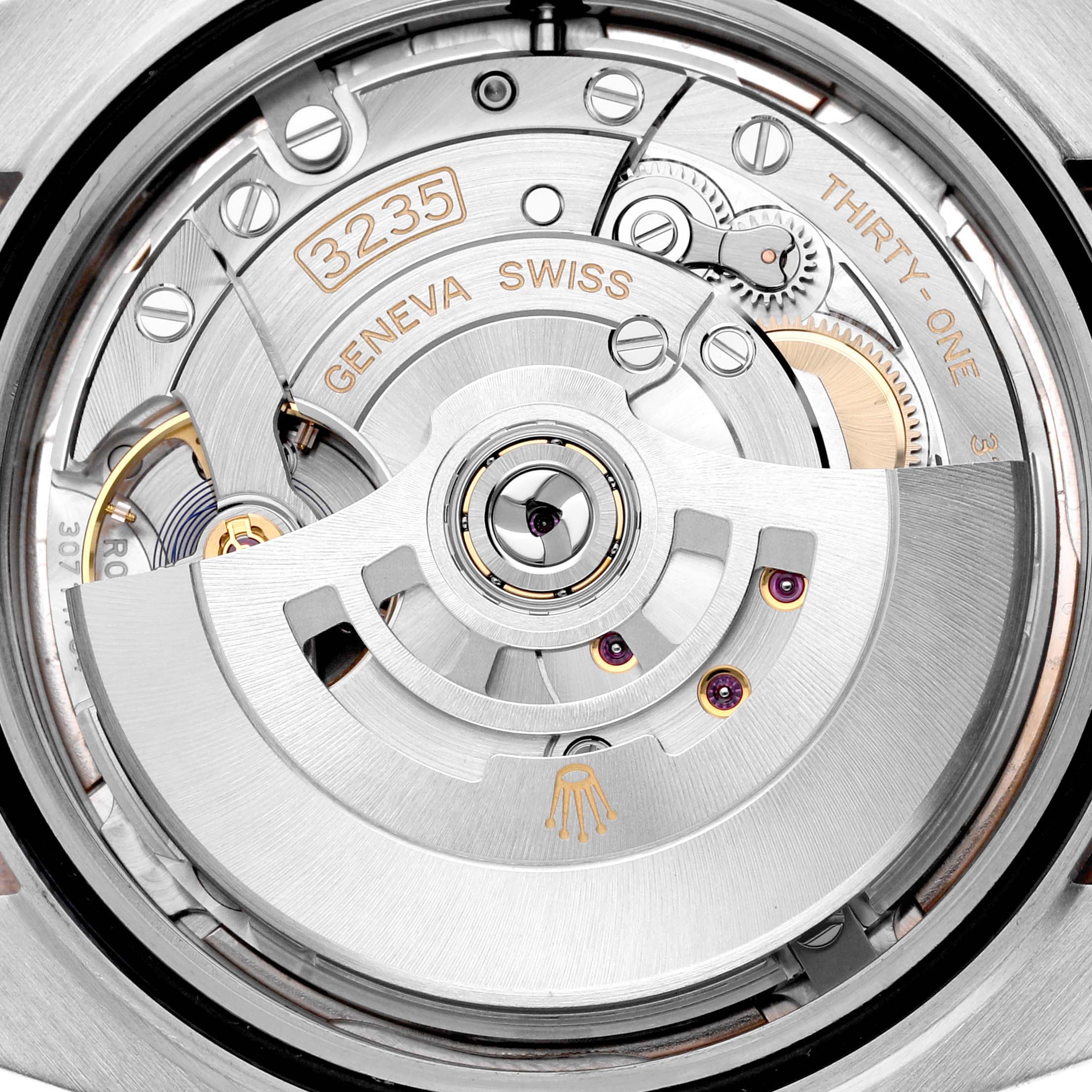 The image shows the open case back of a Rolex Datejust 41 126331 Men's Steel and Gold (two tone) Pink Dial 126331 Men's Steel and Gold (two tone) Pink Dial, revealing its movement and detailed watch mechanics.