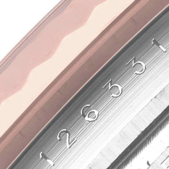 The image shows a close-up of the Datejust 41 model by Rolex, focusing on its bezel and engraved numbers.