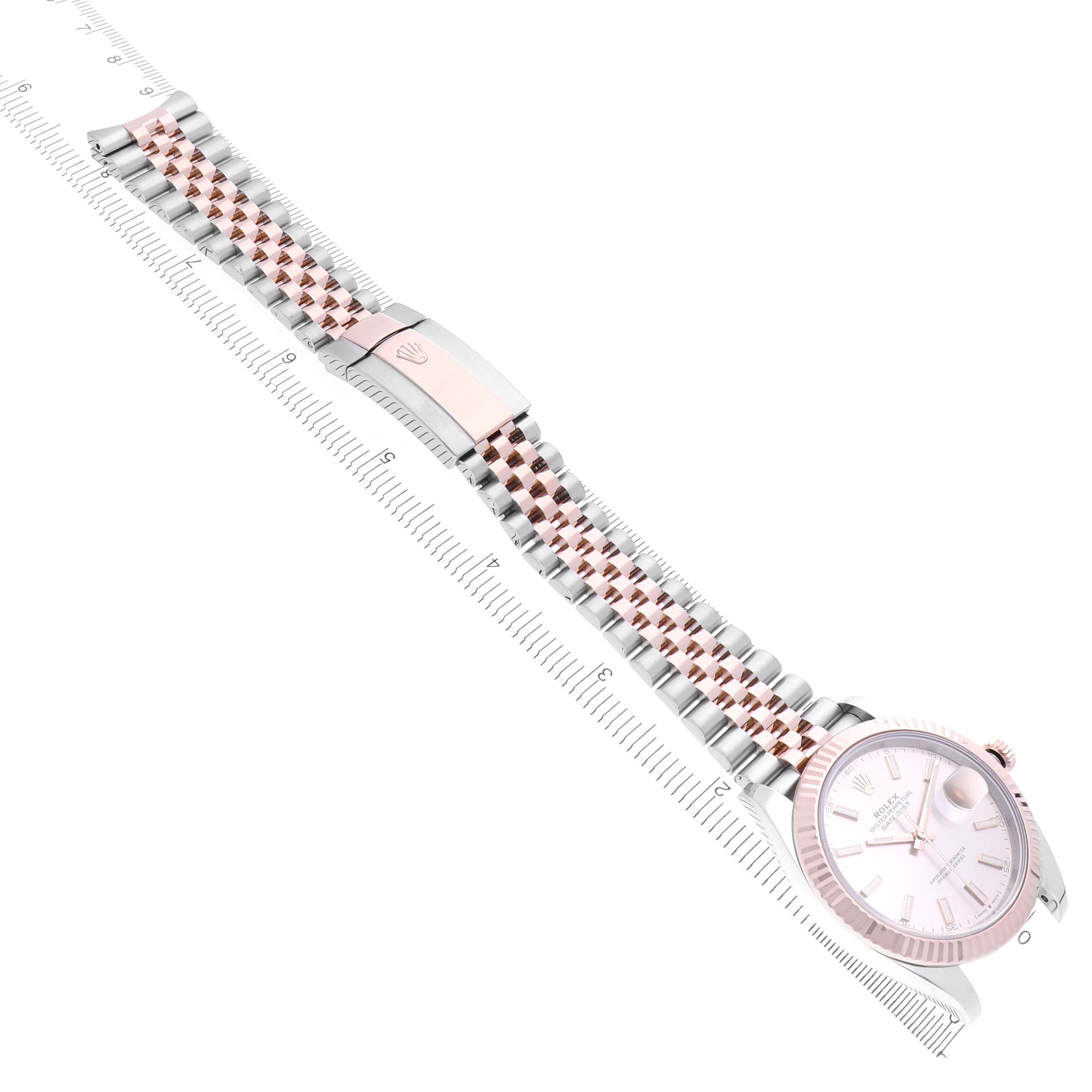 The Rolex Datejust 41 126331 Men's Steel and Gold (two tone) Pink Dial 126331 Men's Steel and Gold (two tone) Pink Dial is shown from a top-down angle, displaying the full bracelet and face.