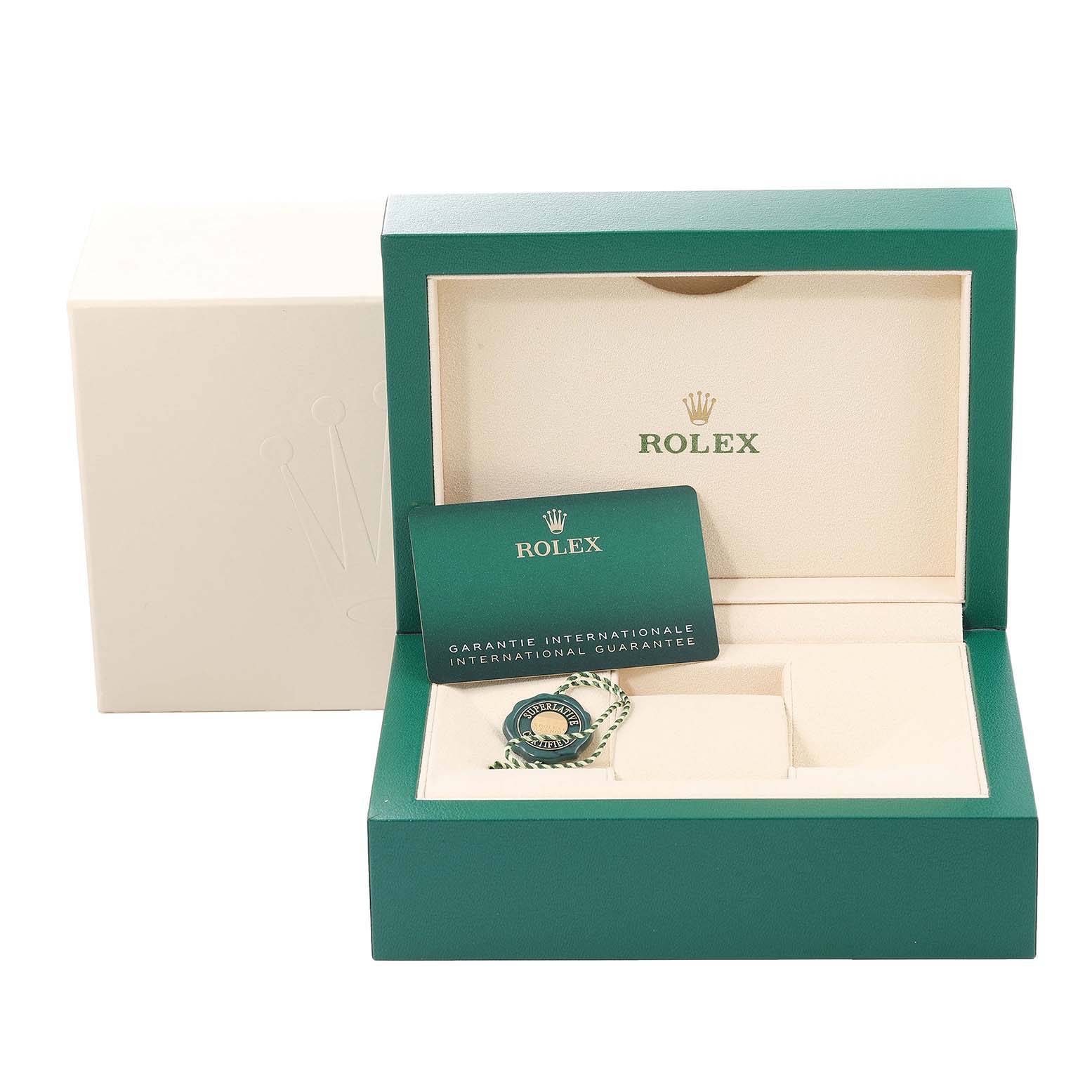 The image shows the open packaging box for the Rolex Datejust 41 126334 Men's Stainless Steel Silver Dial 126334 Men's Stainless Steel Silver Dial with an international guarantee card and a tag.