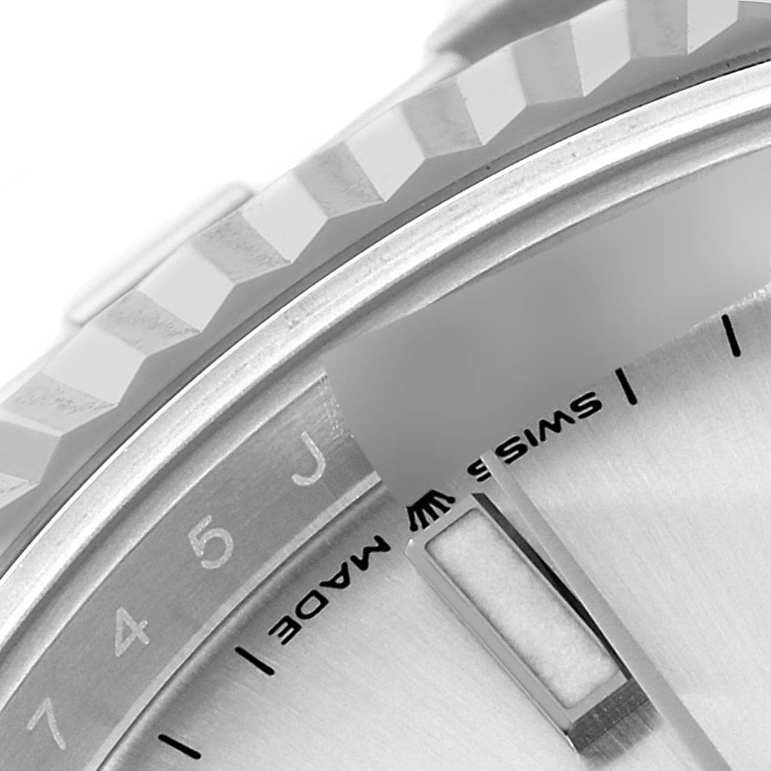 This image shows a close-up of the bezel and partial dial of a Rolex Datejust 41 126334 Men's Stainless Steel Silver Dial 126334 Men's Stainless Steel Silver Dial watch.