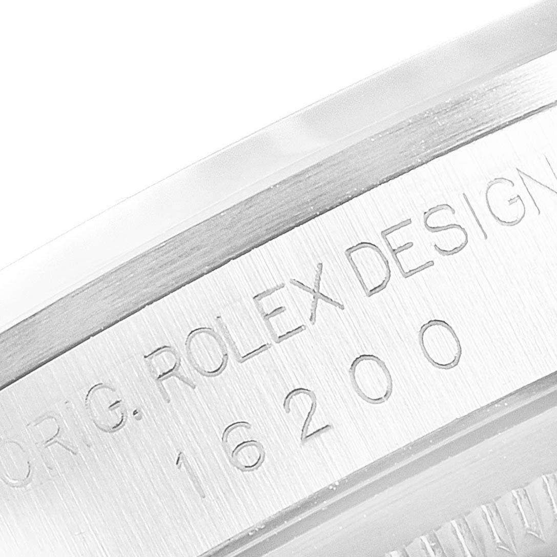 The image shows a close-up of the case side of a Rolex Datejust 16200 Men's Stainless Steel Black Dial 16200 Men's Stainless Steel Black Dial watch, highlighting the engraved model number 16200.