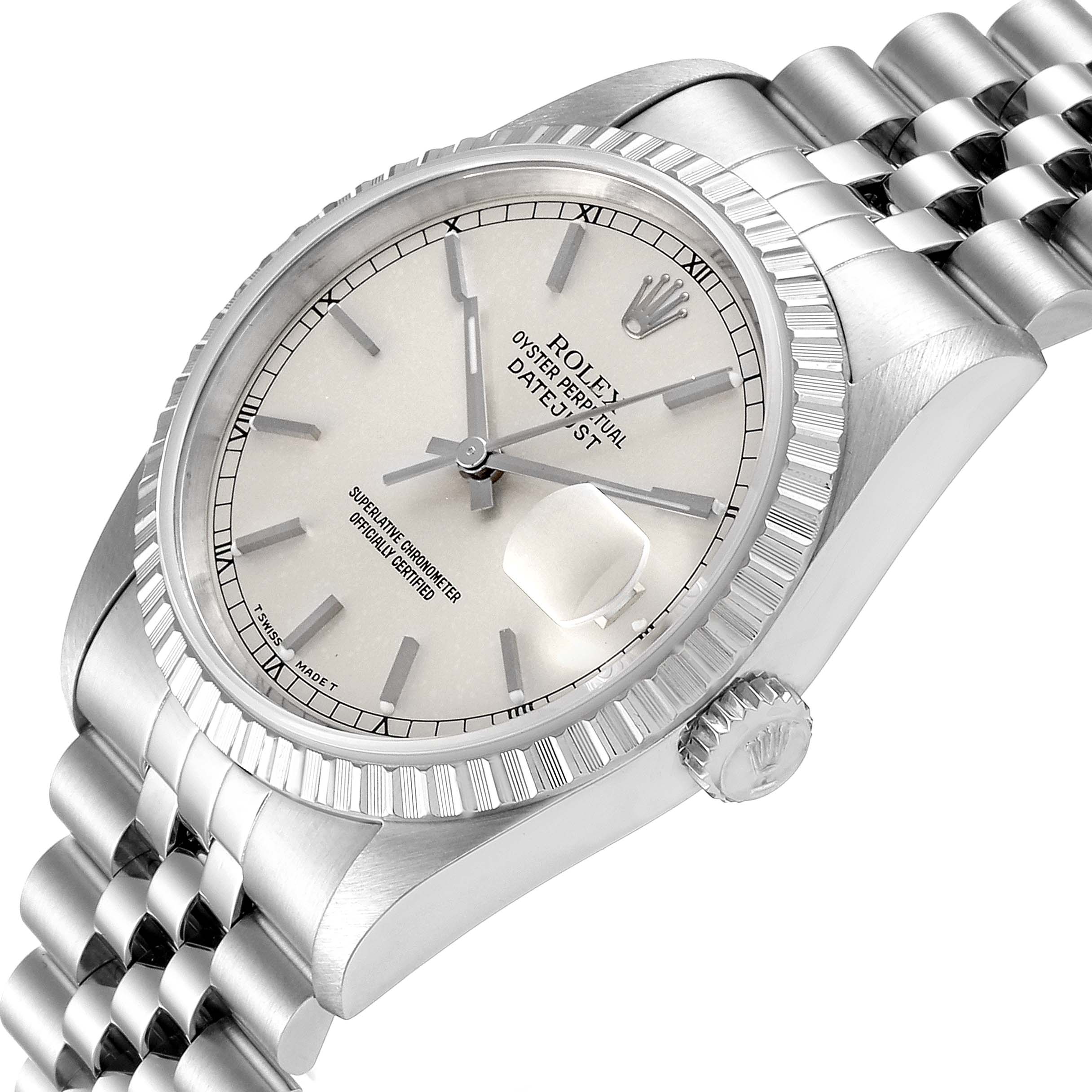 This image shows a Rolex Datejust 16220 Men's Stainless Steel Silver Dial 16220 Men's Stainless Steel Silver Dial watch from an angled top view, highlighting its dial, bezel, crown, and part of its bracelet.