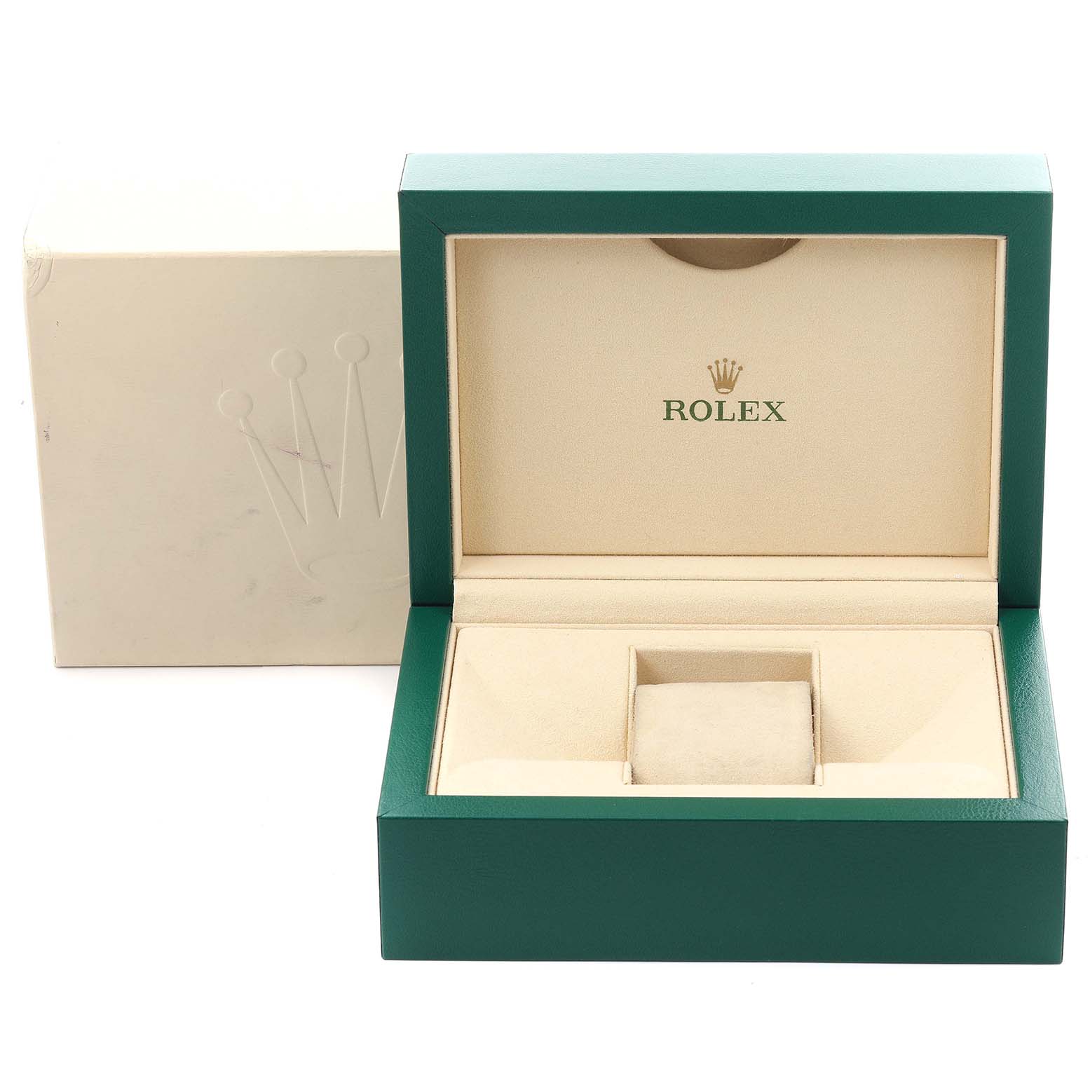 The image shows an open green and beige Rolex box for the Daytona model, with no watch present.