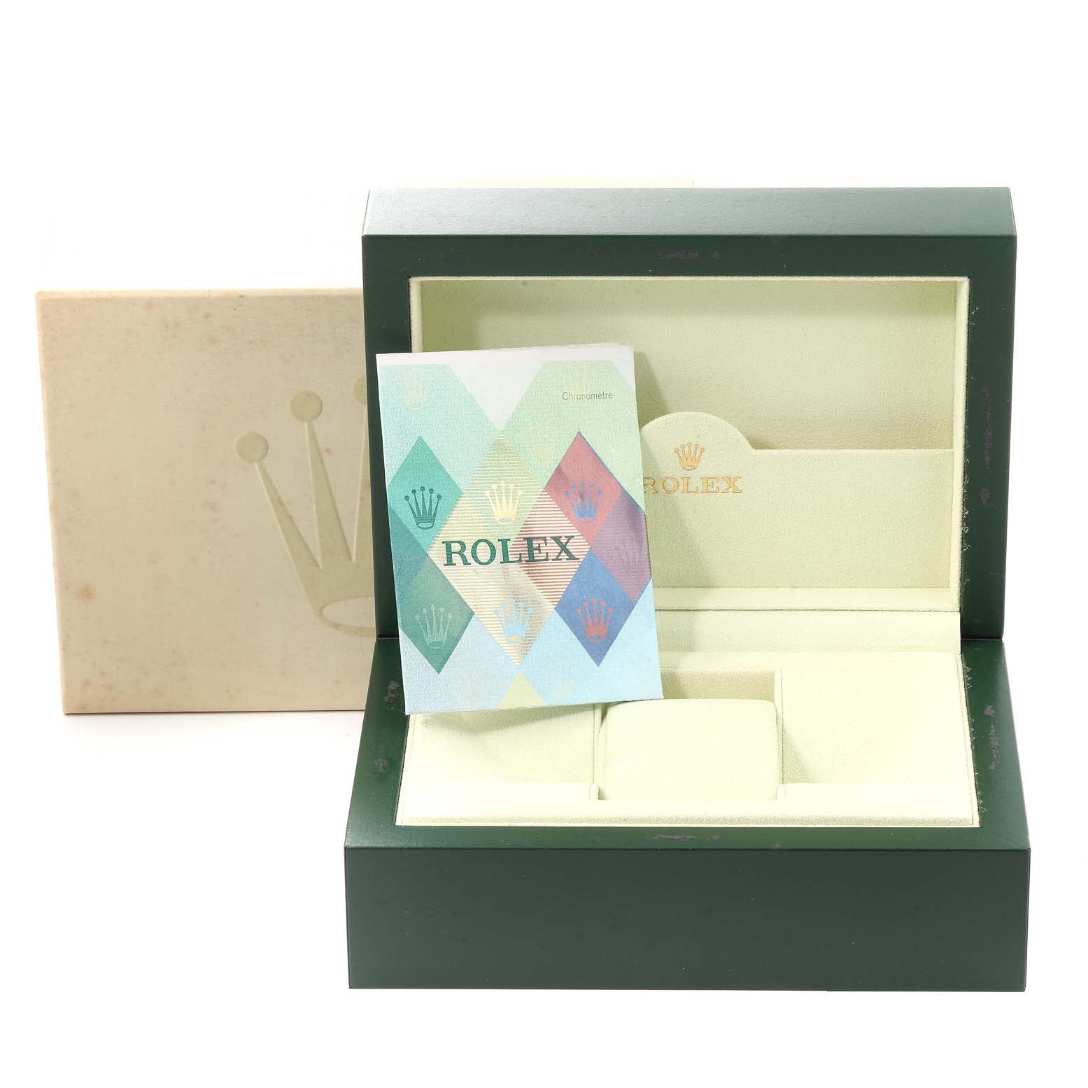 The image shows the box and packaging accessories for a Rolex Daytona 116523 Men's Steel and Gold (two tone) Champagne Dial 116523 Men's Steel and Gold (two tone) Champagne Dial watch, including the inner cushion and a booklet.