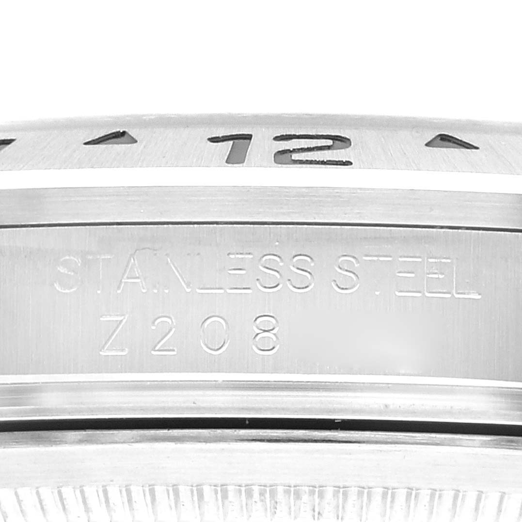 This image shows a close-up of the side of the Rolex Explorer 16570 Men
s Stainless Steel Black Dial 16570 Men
s Stainless Steel Black Dial watch, highlighting the stainless steel engraving.