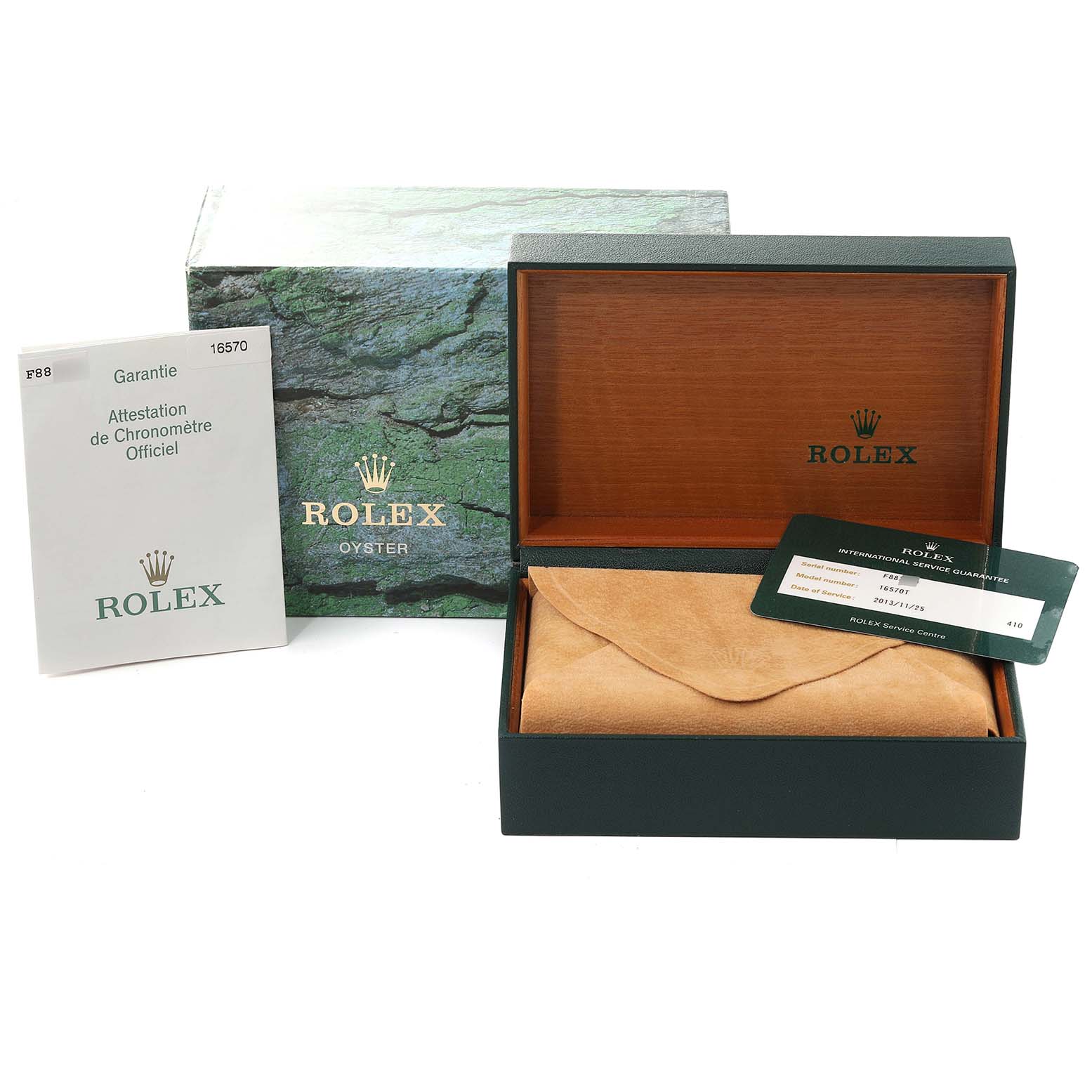 This image shows the packaging, guarantee card, and inner and outer boxes for a Rolex Explorer 16570T Men
s Stainless Steel Black Dial 16570T Men
s Stainless Steel Black Dial watch.