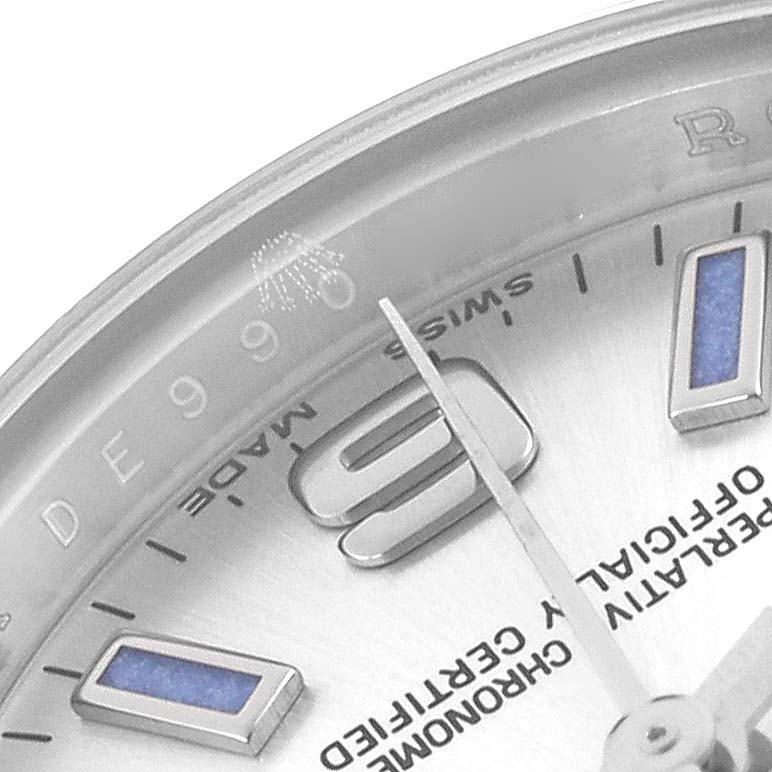 The image shows a close-up of the dial edge, hour markers, and hands of a Rolex Oyster Perpetual 176200 Women's Stainless Steel Silver Dial 176200 Women's Stainless Steel Silver Dial watch.