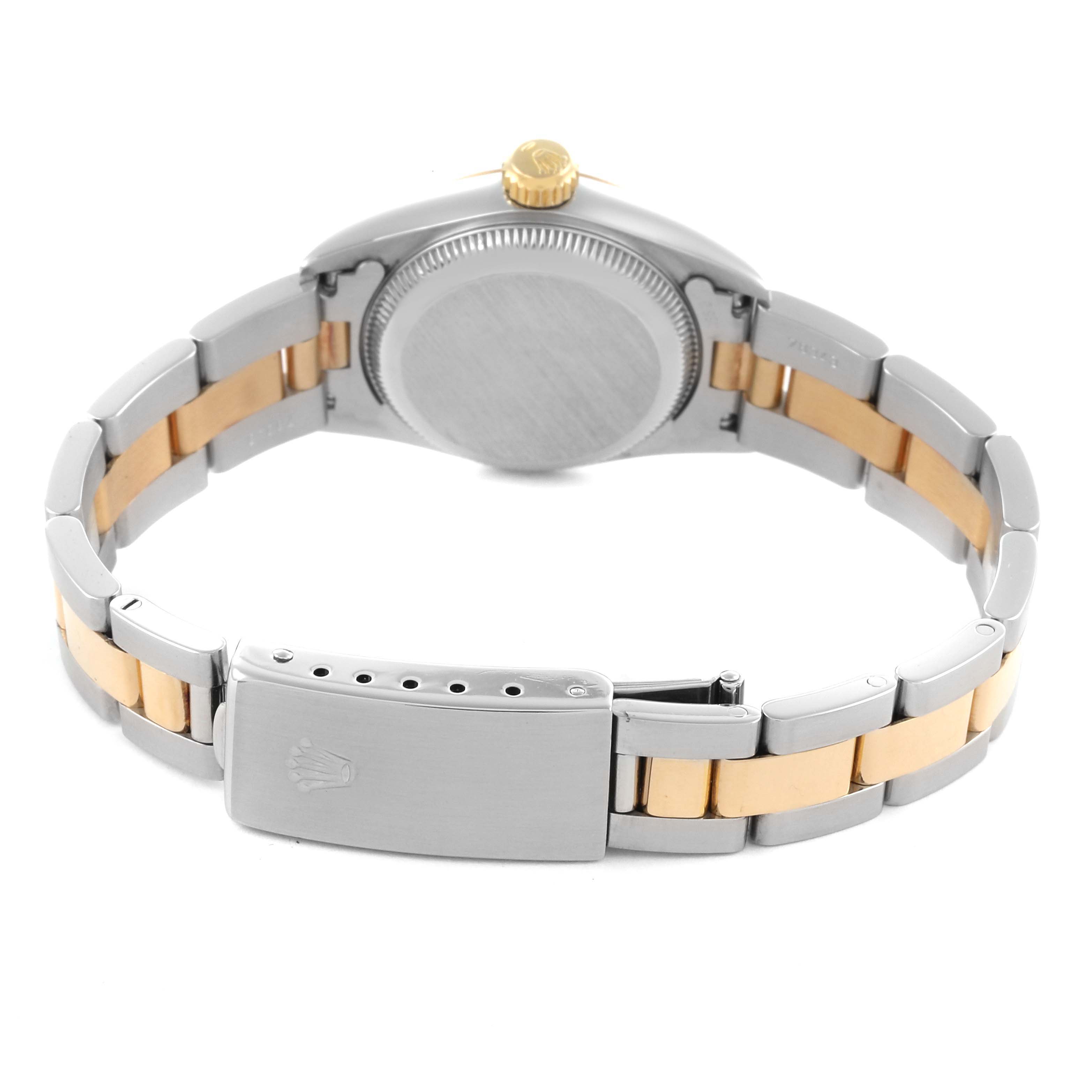 The Rolex Oyster Perpetual 67183 Women's Steel and Gold (two tone) Grey Dial 67183 Women's Steel and Gold (two tone) Grey Dial watch is shown from the back, displaying the bracelet, clasp, case back, and crown.