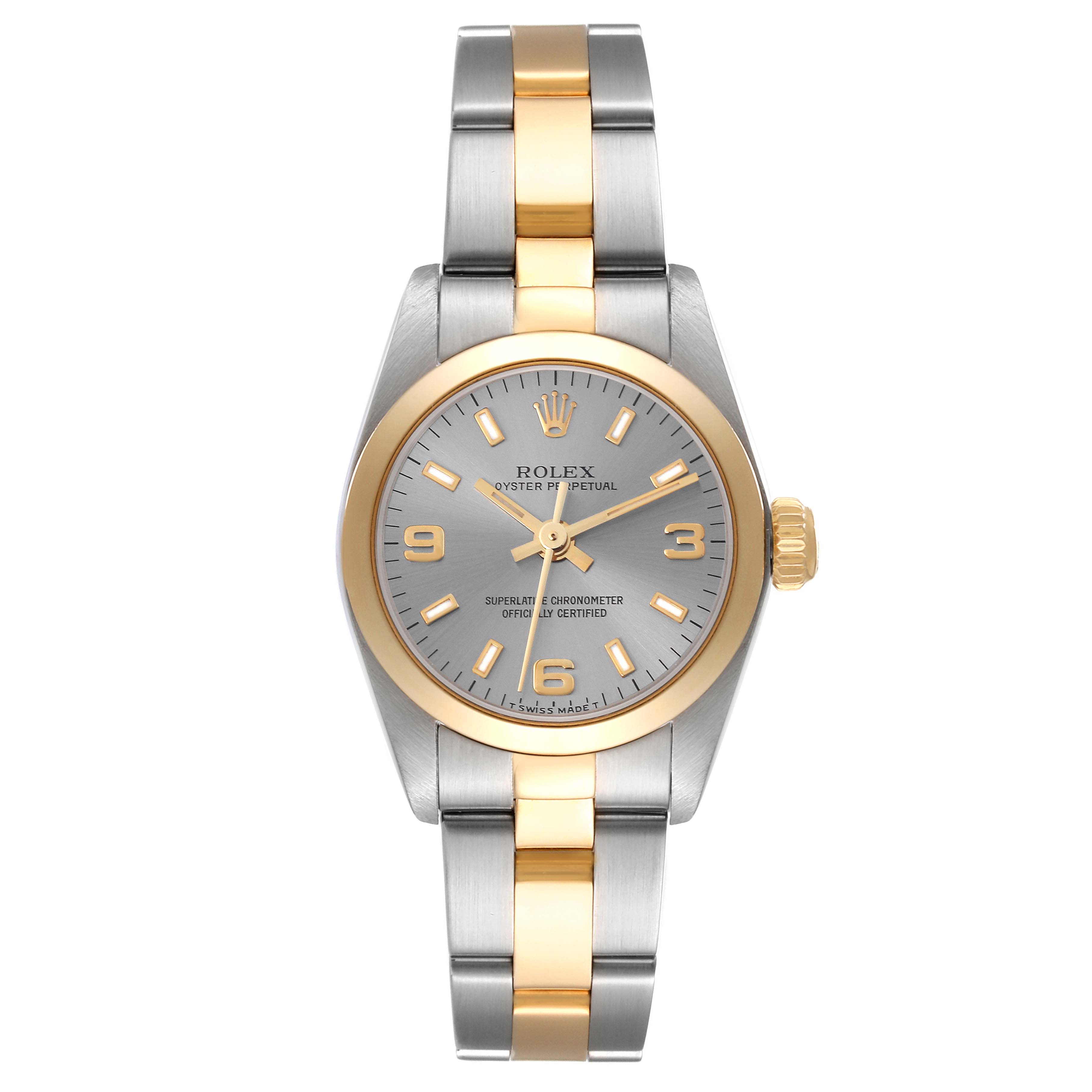 The Rolex Oyster Perpetual 67183 Women's Steel and Gold (two tone) Grey Dial 67183 Women's Steel and Gold (two tone) Grey Dial watch is shown from a top-down angle, highlighting the dial, bezel, and two-tone bracelet.
