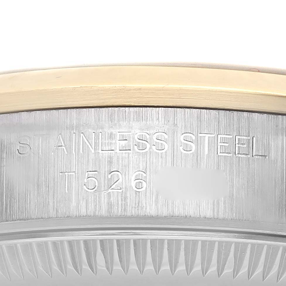 The image shows a close-up of the side of a Rolex Oyster Perpetual 67183 Women's Steel and Gold (two tone) Grey Dial 67183 Women's Steel and Gold (two tone) Grey Dial watch, focusing on the stainless steel case and bezel.