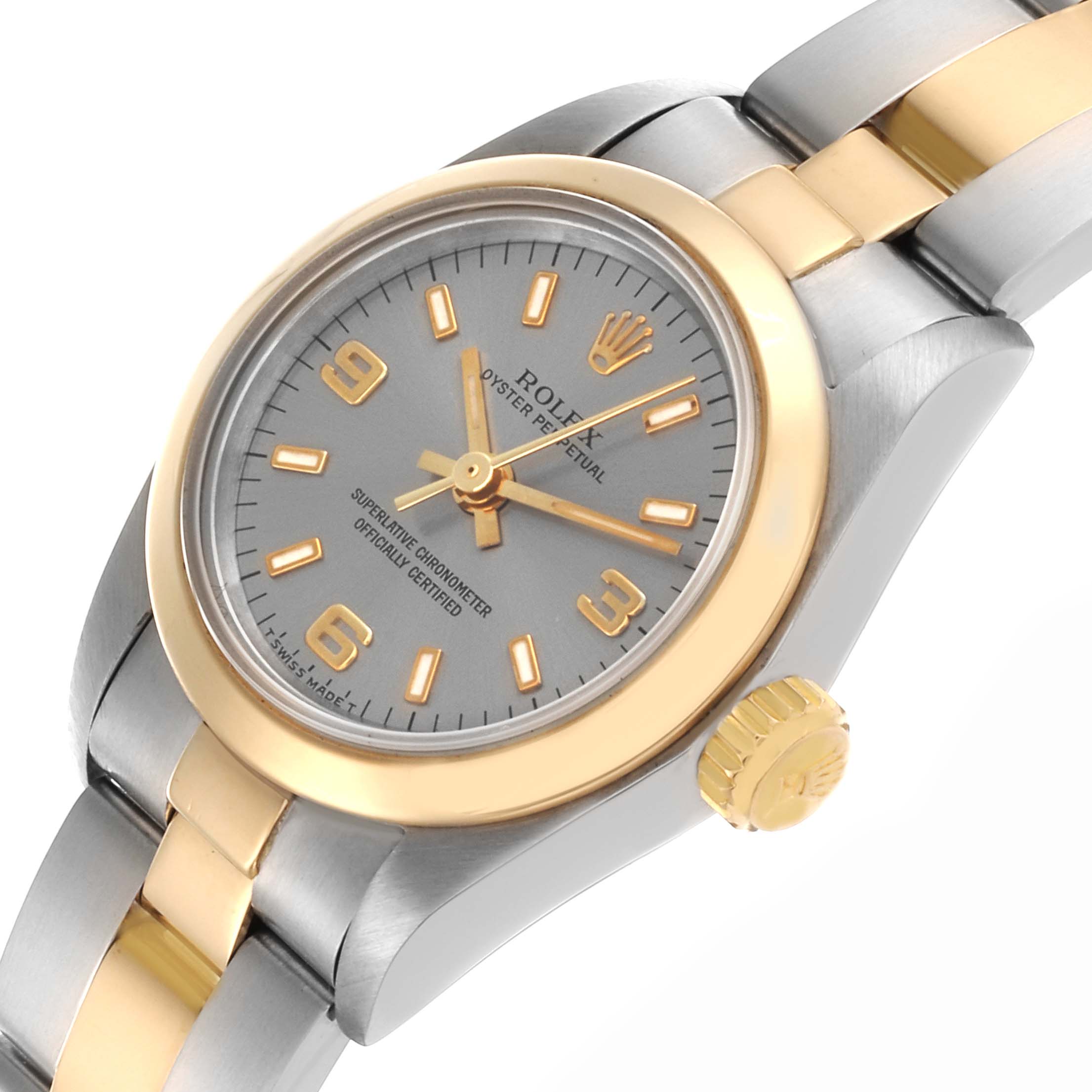 The Rolex Oyster Perpetual 67183 Women's Steel and Gold (two tone) Grey Dial 67183 Women's Steel and Gold (two tone) Grey Dial watch is shown at a slight angle, highlighting the dial, bezel, crown, and part of the bracelet.