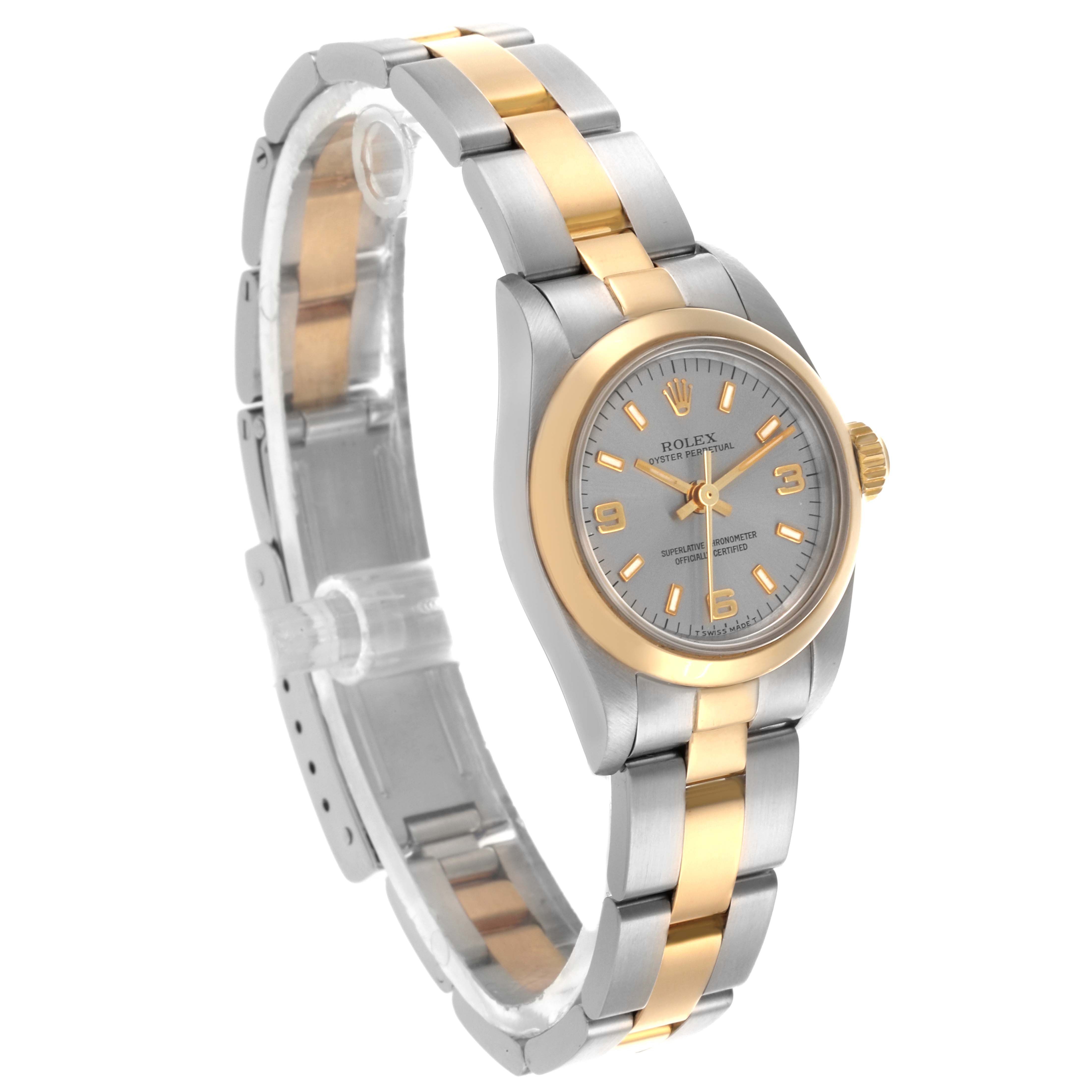The Rolex Oyster Perpetual 67183 Women's Steel and Gold (two tone) Grey Dial 67183 Women's Steel and Gold (two tone) Grey Dial watch is shown at a slight angle, highlighting the face, bezel, and part of the bracelet.