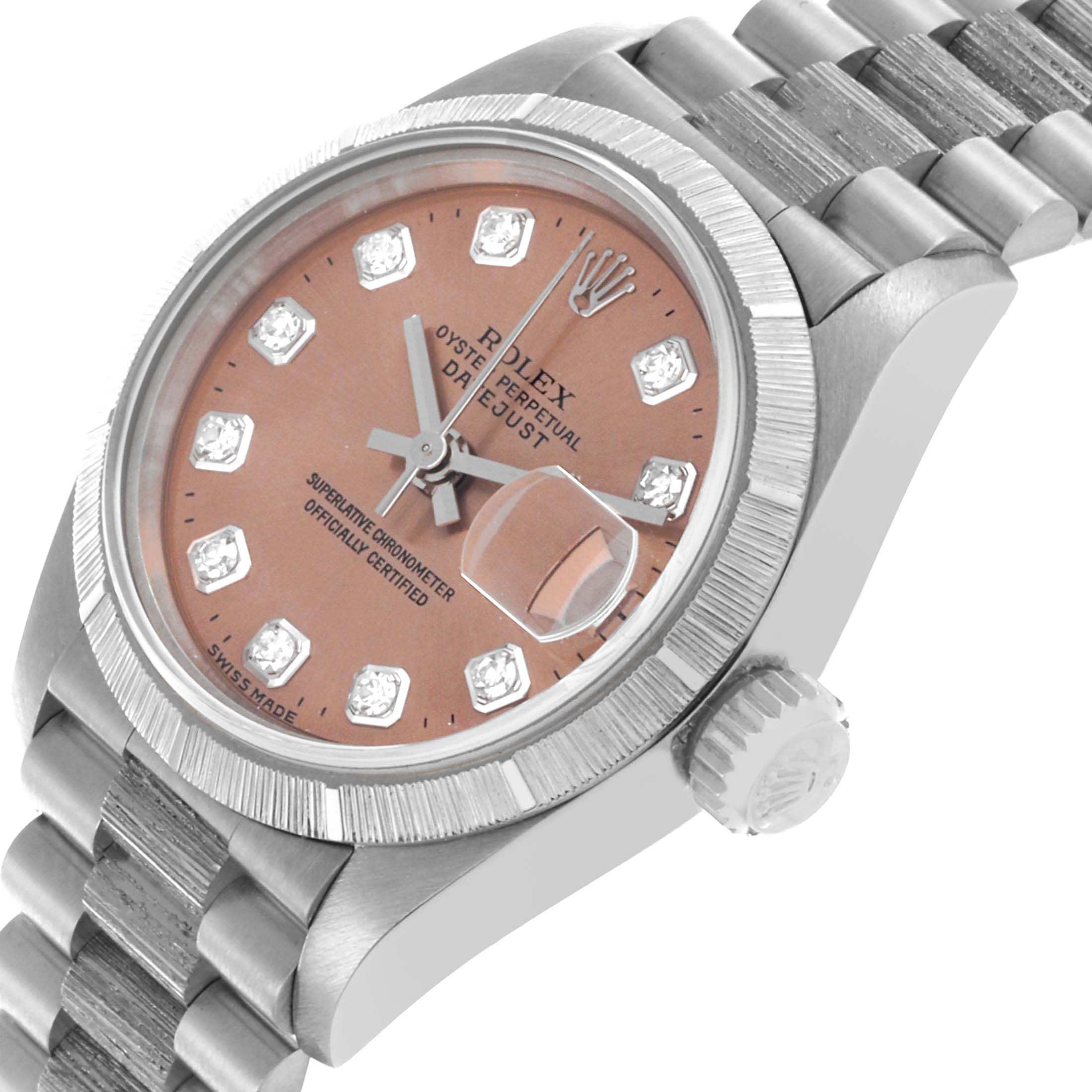The Rolex President 69278 Women's White Gold Pink Dial 69278 Women's White Gold Pink Dial watch is shown at an angle highlighting the dial, bezel, case, and bracelet.
