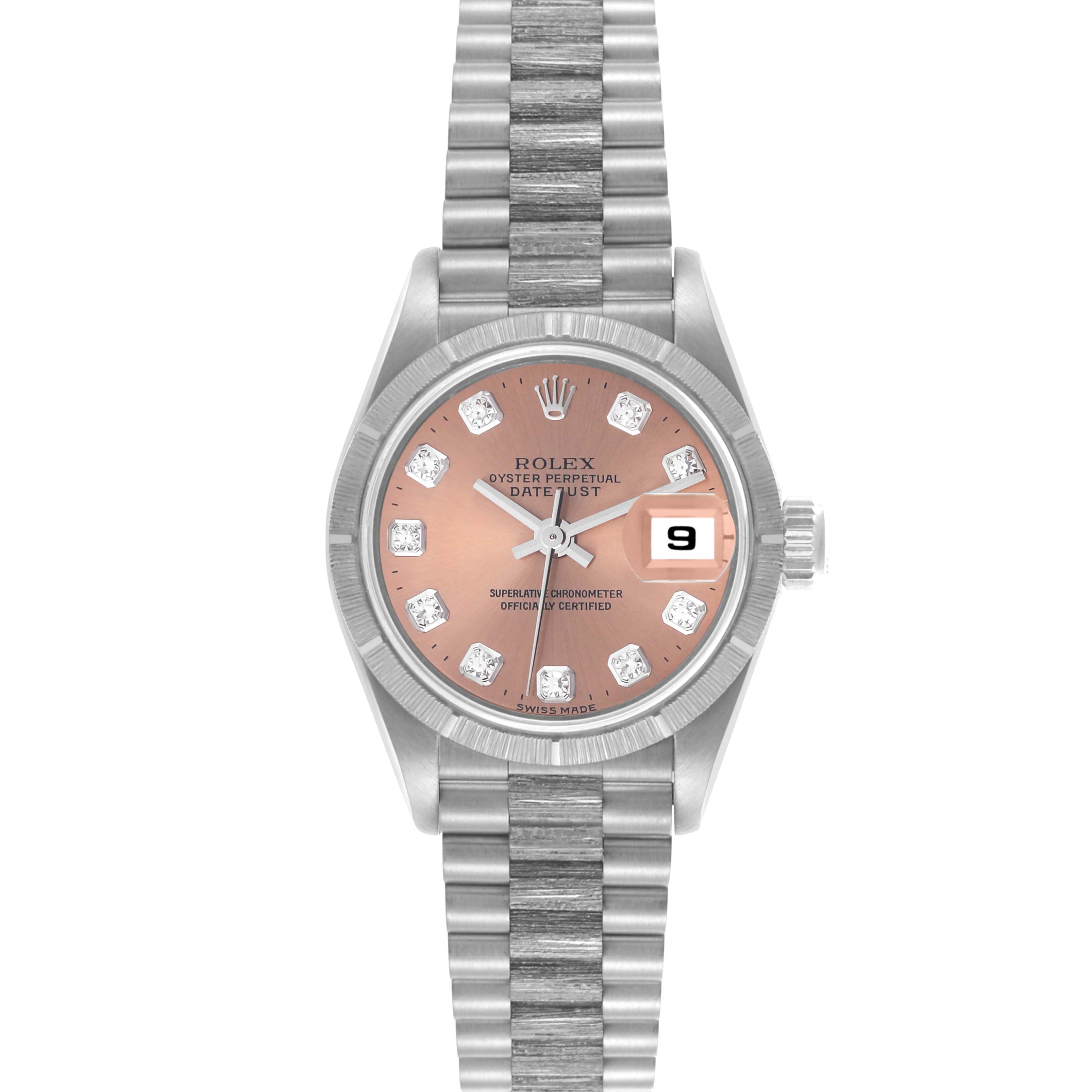 The Rolex President 69278 Women's White Gold Pink Dial 69278 Women's White Gold Pink Dial model is shown from the front, displaying the dial, fluted bezel, bracelet, and date window.