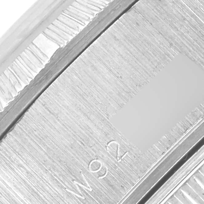 The image shows a close-up of the side details and engraved markings on a Rolex President 69278 Women's White Gold Pink Dial 69278 Women's White Gold Pink Dial model.