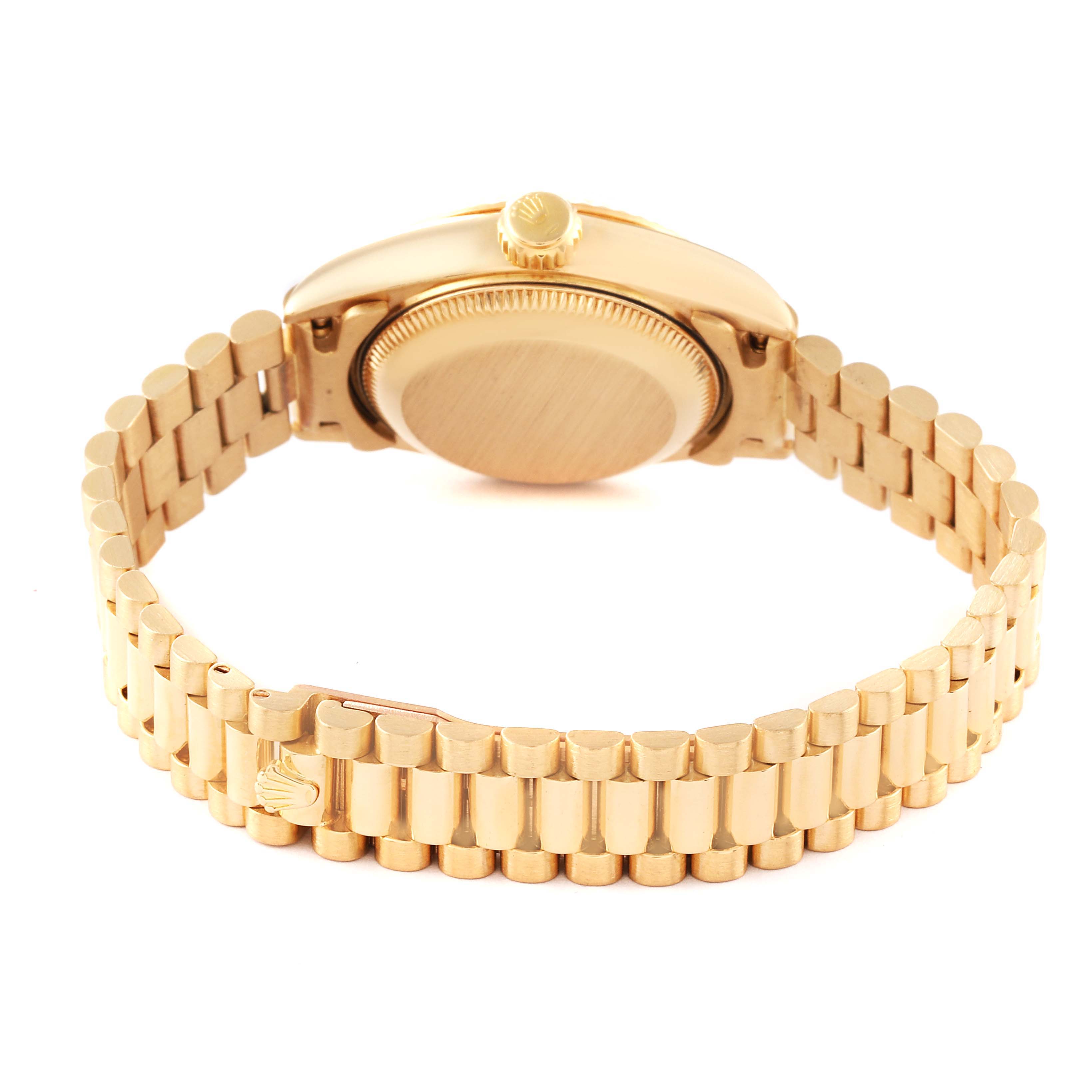 The image shows the back view of a Rolex President 69178 Women
s Yellow Gold Champagne Dial 69178 Women
s Yellow Gold Champagne Dial model watch, highlighting the caseback and the gold bracelet.