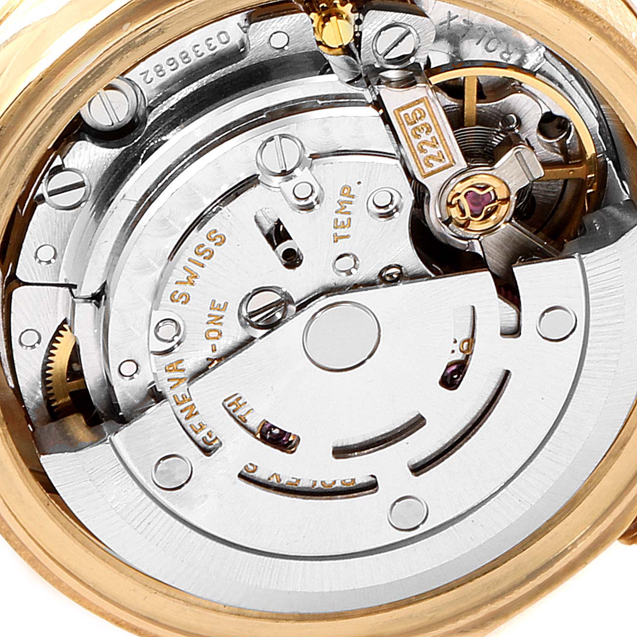 This image shows the intricate internal movement of a Rolex President 79178 Women
s Yellow Gold Champagne Dial 79178 Women
s Yellow Gold Champagne Dial model watch with gears and a rotor.