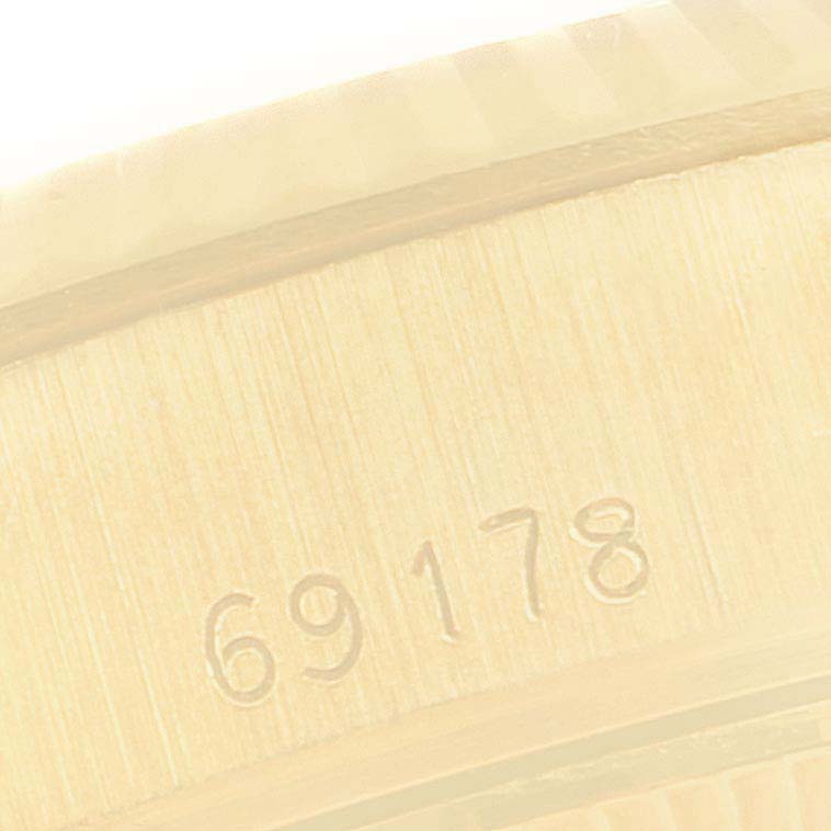 This close-up image shows the case back of a Rolex President 69178 Women
s Yellow Gold Champagne Dial 69178 Women
s Yellow Gold Champagne Dial model watch, displaying the model number 69178.