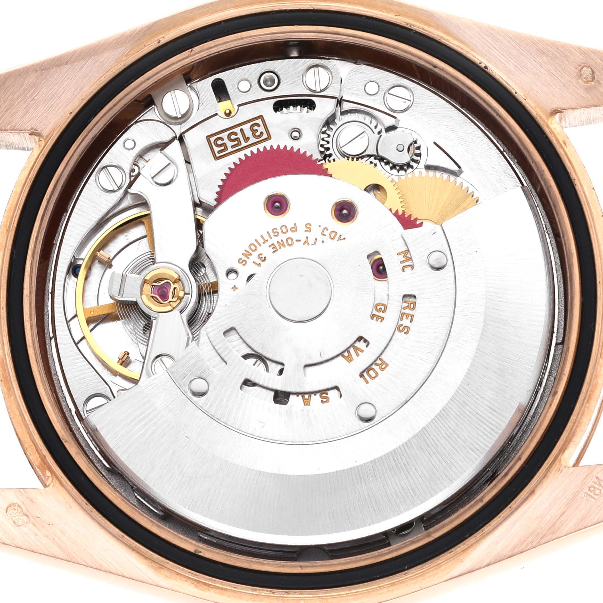 The image shows the back view of a Rolex President 118235 Men
s Rose Gold Pink Dial 118235 Men
s Rose Gold Pink Dial watch, highlighting its movement and internal components.