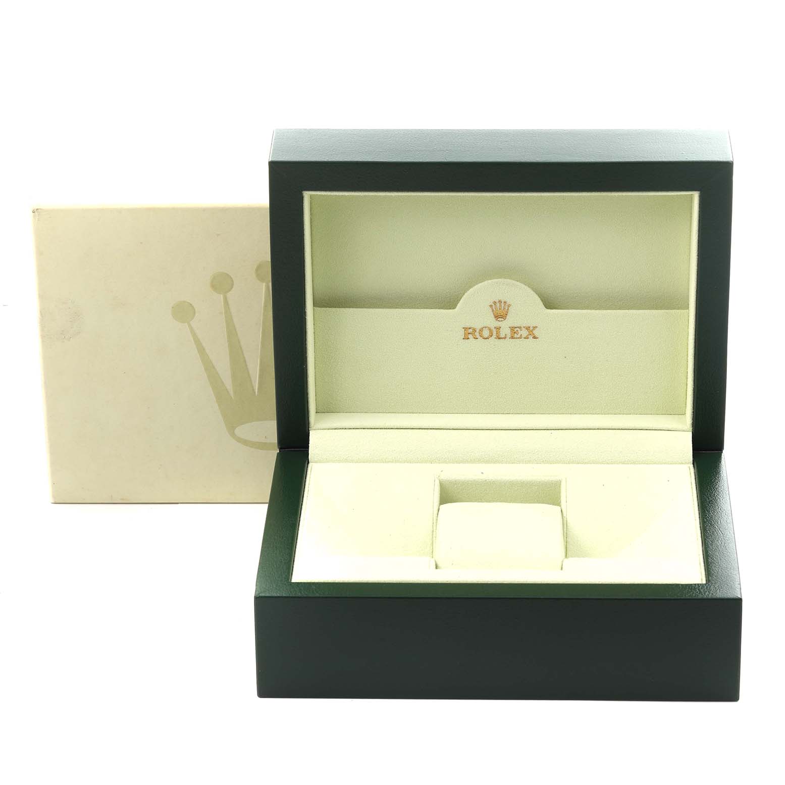 The image shows an open box for a Rolex President 118235 Men
s Rose Gold Pink Dial 118235 Men
s Rose Gold Pink Dial model from the top, featuring the logo inside.