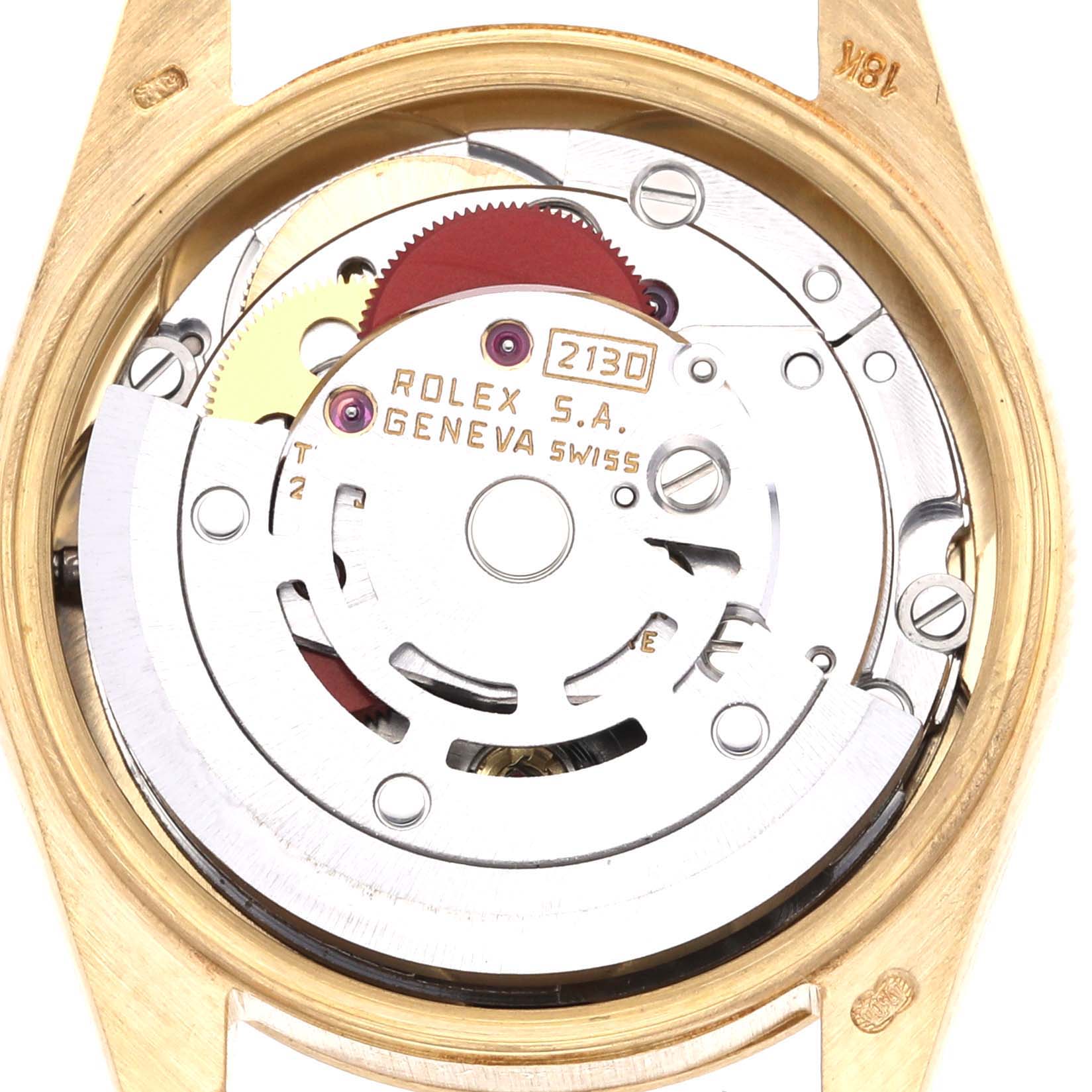 The image shows the internal mechanism of a Rolex President 67198 Women's Yellow Gold Champagne Dial 67198 Women's Yellow Gold Champagne Dial watch, highlighting gears and engravings.