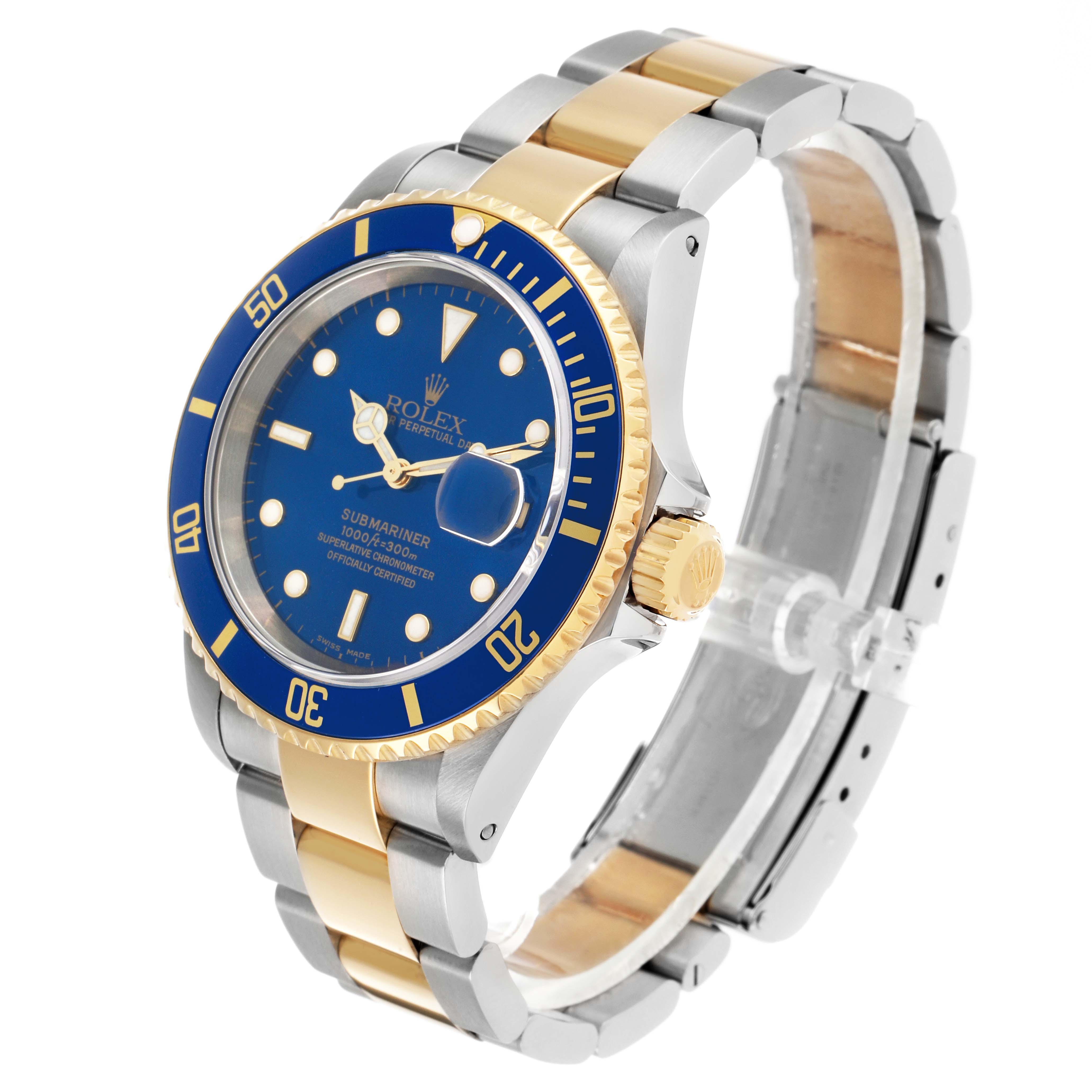 The image shows a Rolex Submariner 16613 Men's Steel and Gold (two tone) Blue Dial watch at a three-quarter angle, highlighting the dial, bezel, crown, and bracelet.