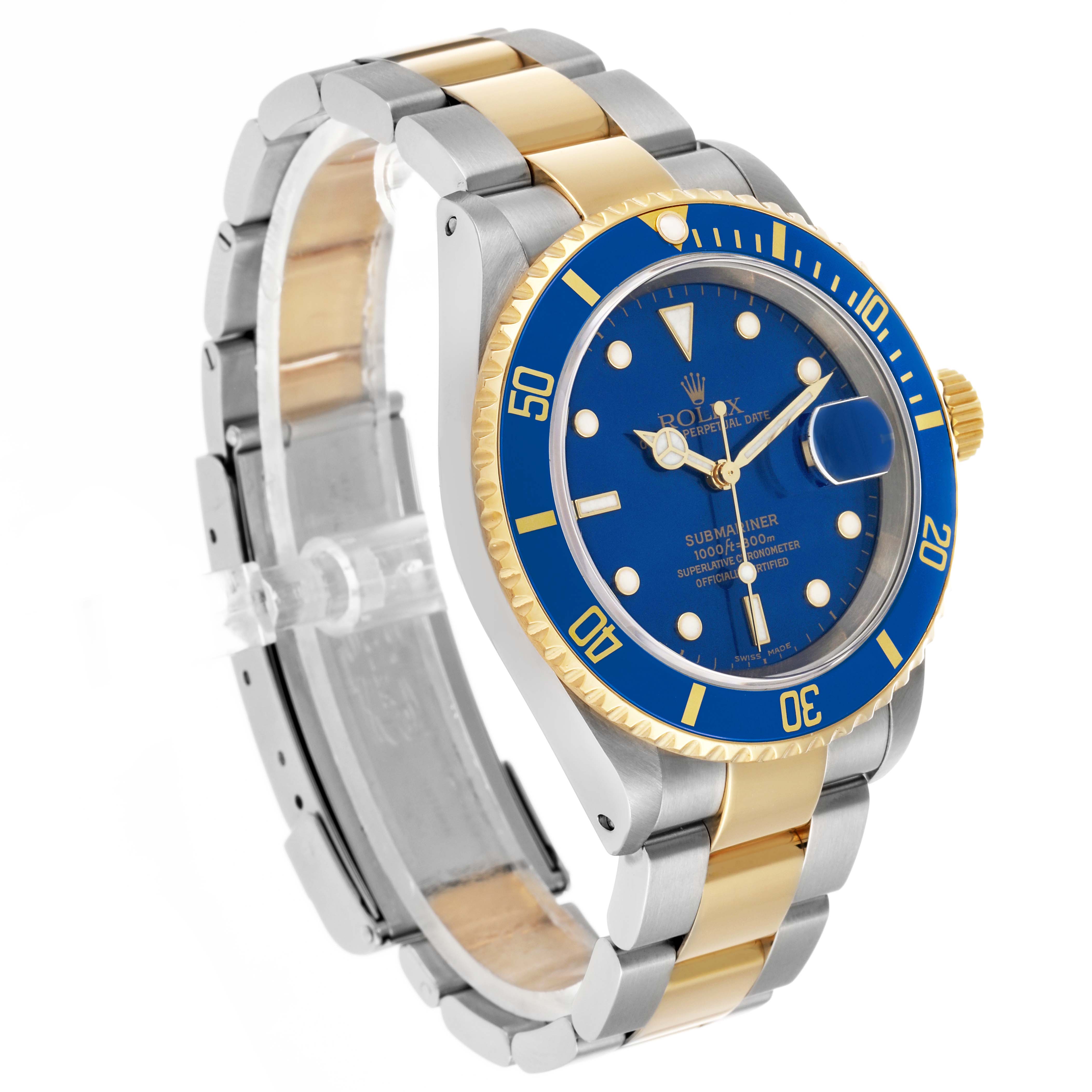 The Rolex Submariner 16613 Men's Steel and Gold (two tone) Blue Dial watch is shown at a three-quarter angle, highlighting its blue dial, bezel, and gold and silver bracelet.