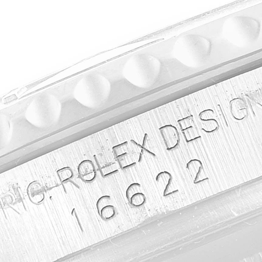 The image shows a close-up of the bezel and case with engravings of the Rolex Yacht-Master 16622 Men
s Stainless Steel Silver Dial 16622 Men
s Stainless Steel Silver Dial model 16622.