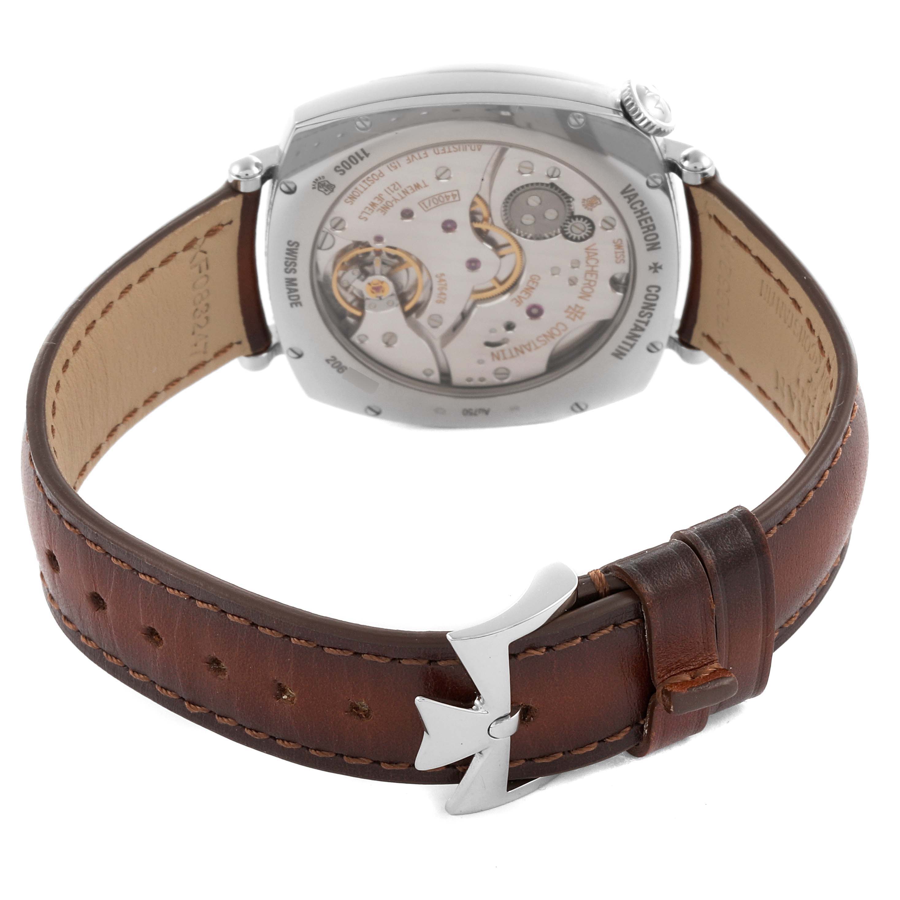 The Vacheron Constantin Historiques 1100S/000G-B734 Men's White Gold Silver Dial 1100S/000G-B734 Men's White Gold Silver Dial watch is shown from the back, highlighting the movement and brown leather strap with a distinctive clasp.