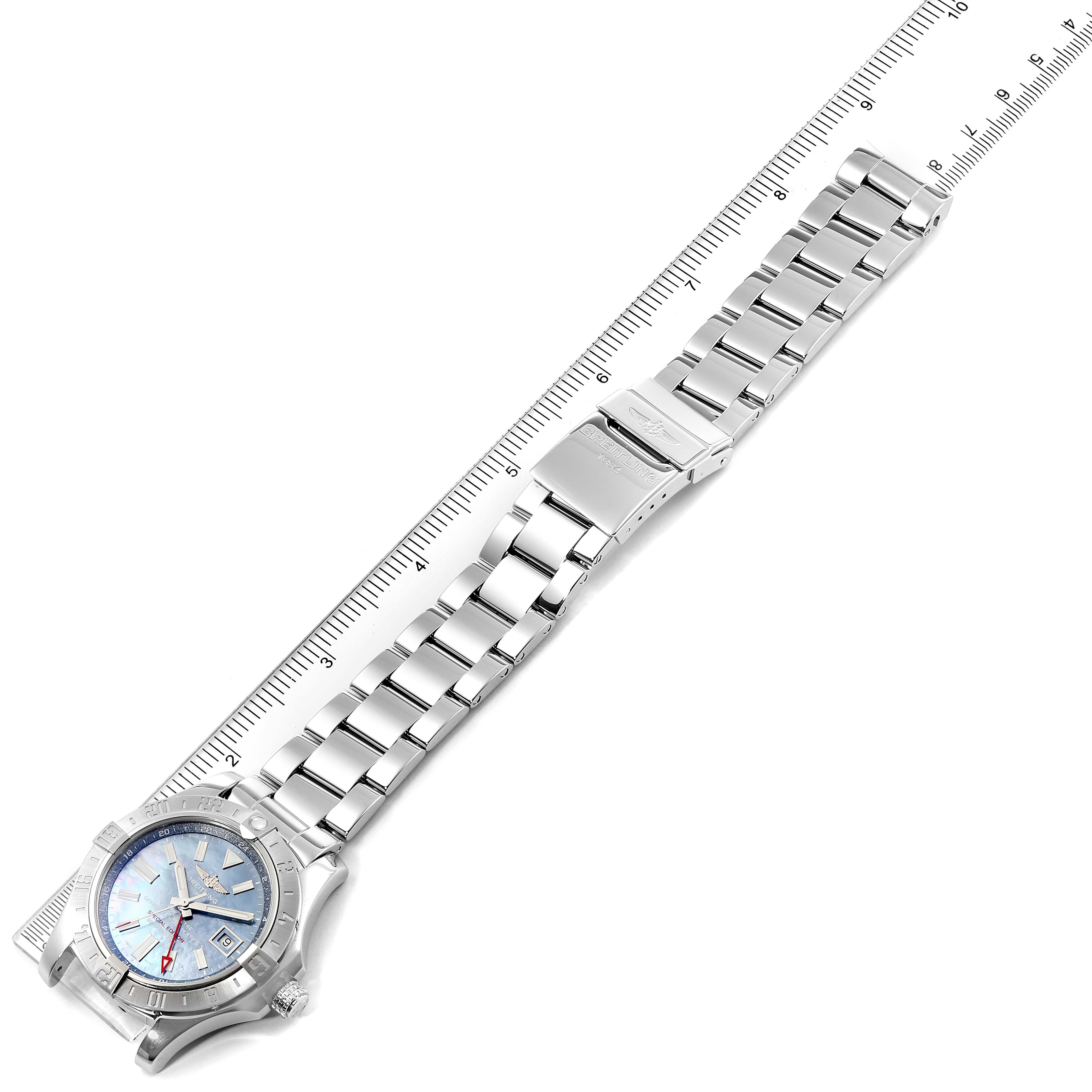 The image shows a Breitling Avenger A3239011-C872-170A Men's Stainless Steel Mother of Pearl Dial A3239011-C872-170A Men's Stainless Steel Mother of Pearl Dial watch laid flat with its stainless steel bracelet extended next to a ruler for size reference.