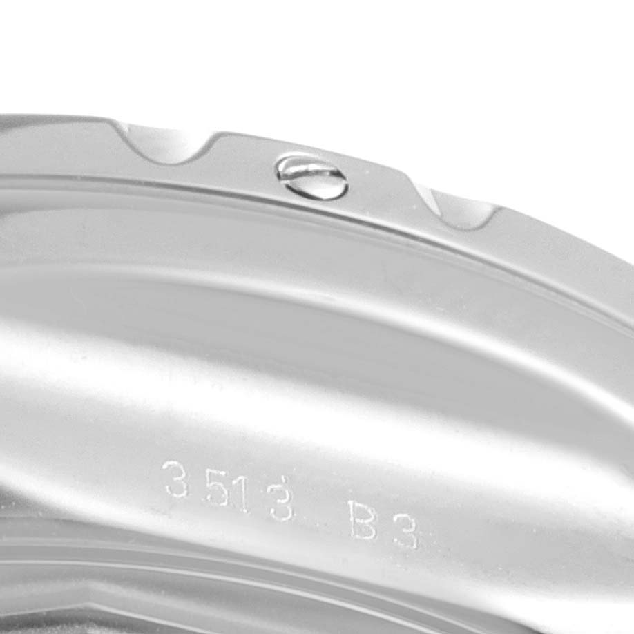 This image shows a close-up view of the side and part of the back of a Breitling Bentley A13362 Men's Stainless Steel Black Dial A13362 Men's Stainless Steel Black Dial watch, displaying a screw and engraved text "3513 B3."