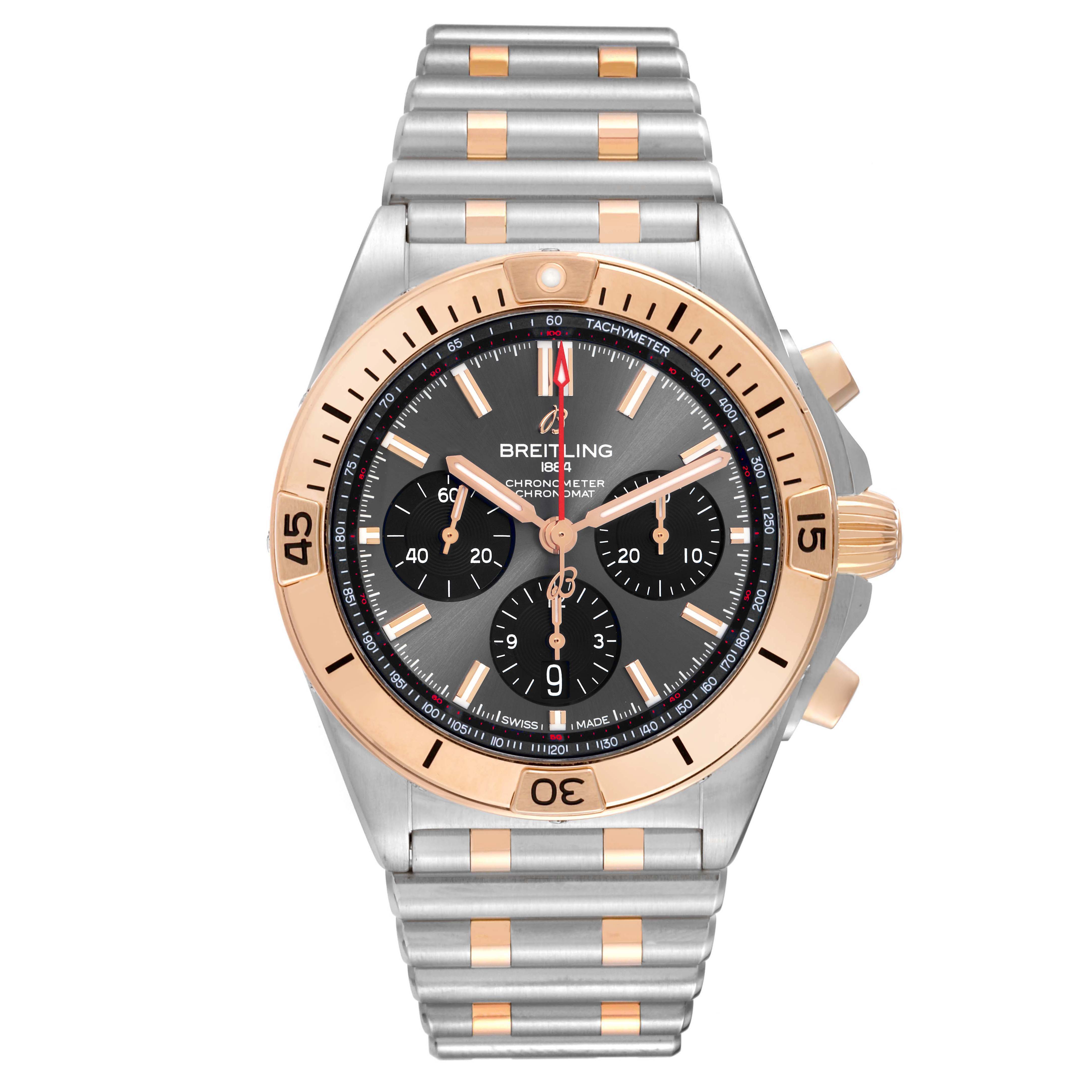 The Breitling Chronomat UB0134 Men's Steel and Gold (two tone) Grey Dial watch is shown from a top-down angle, displaying the face, bezel, and metal bracelet.