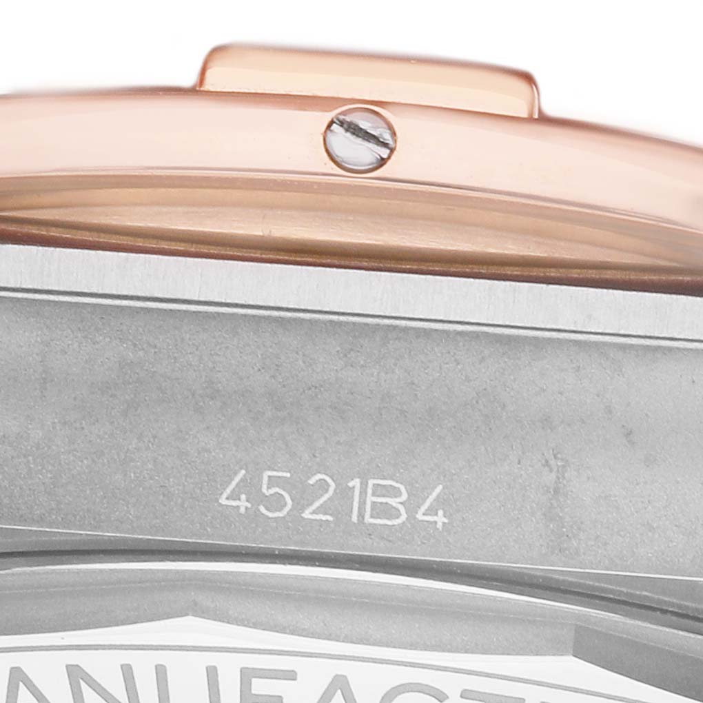 The image shows a side view of the Breitling Chronomat UB0134 Men's Steel and Gold (two tone) Grey Dial watch casing, focusing on the metal edge and a side screw detail.