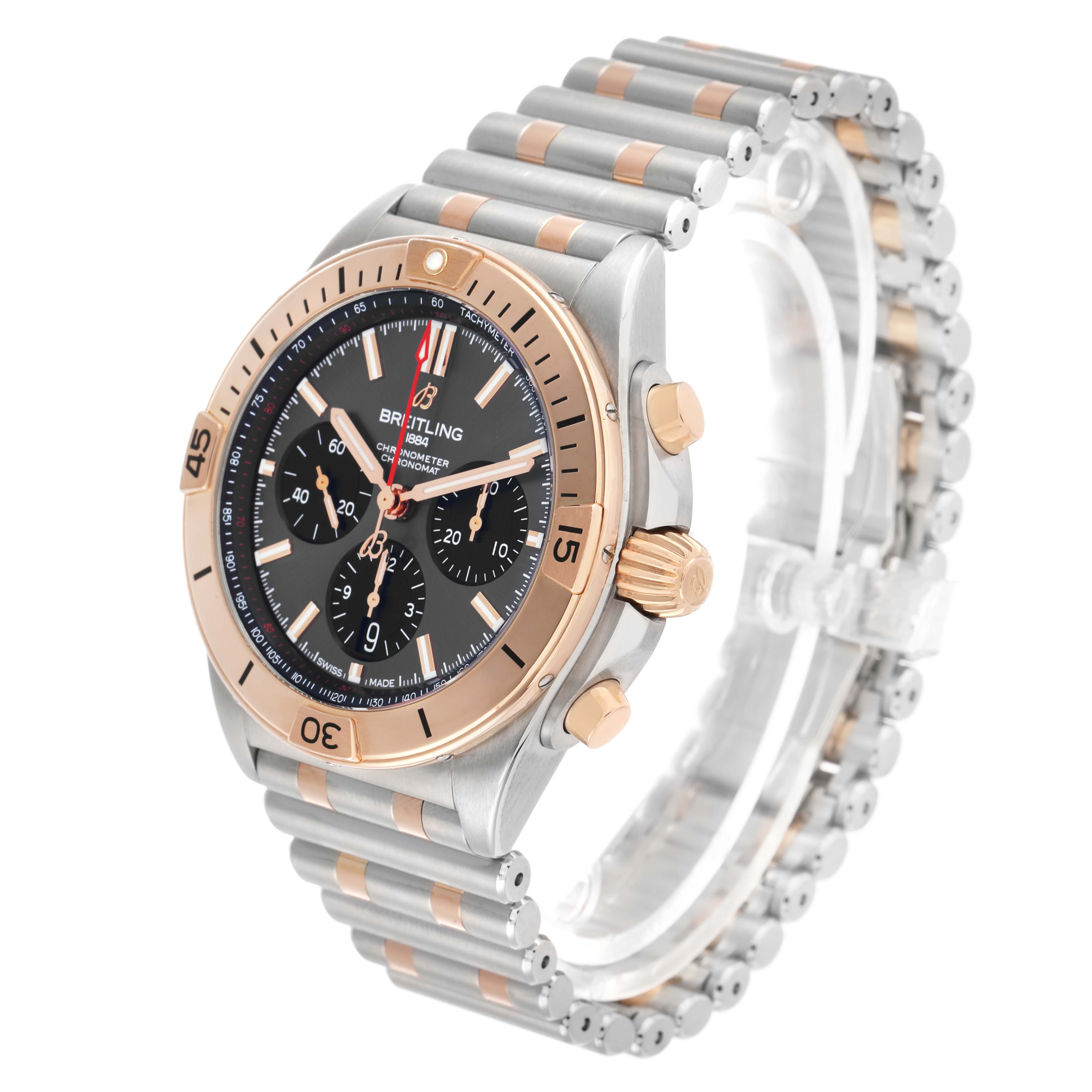 The Breitling Chronomat UB0134 Men's Steel and Gold (two tone) Grey Dial watch is shown at a slight angle, highlighting the face, bezel, crown, and bracelet.
