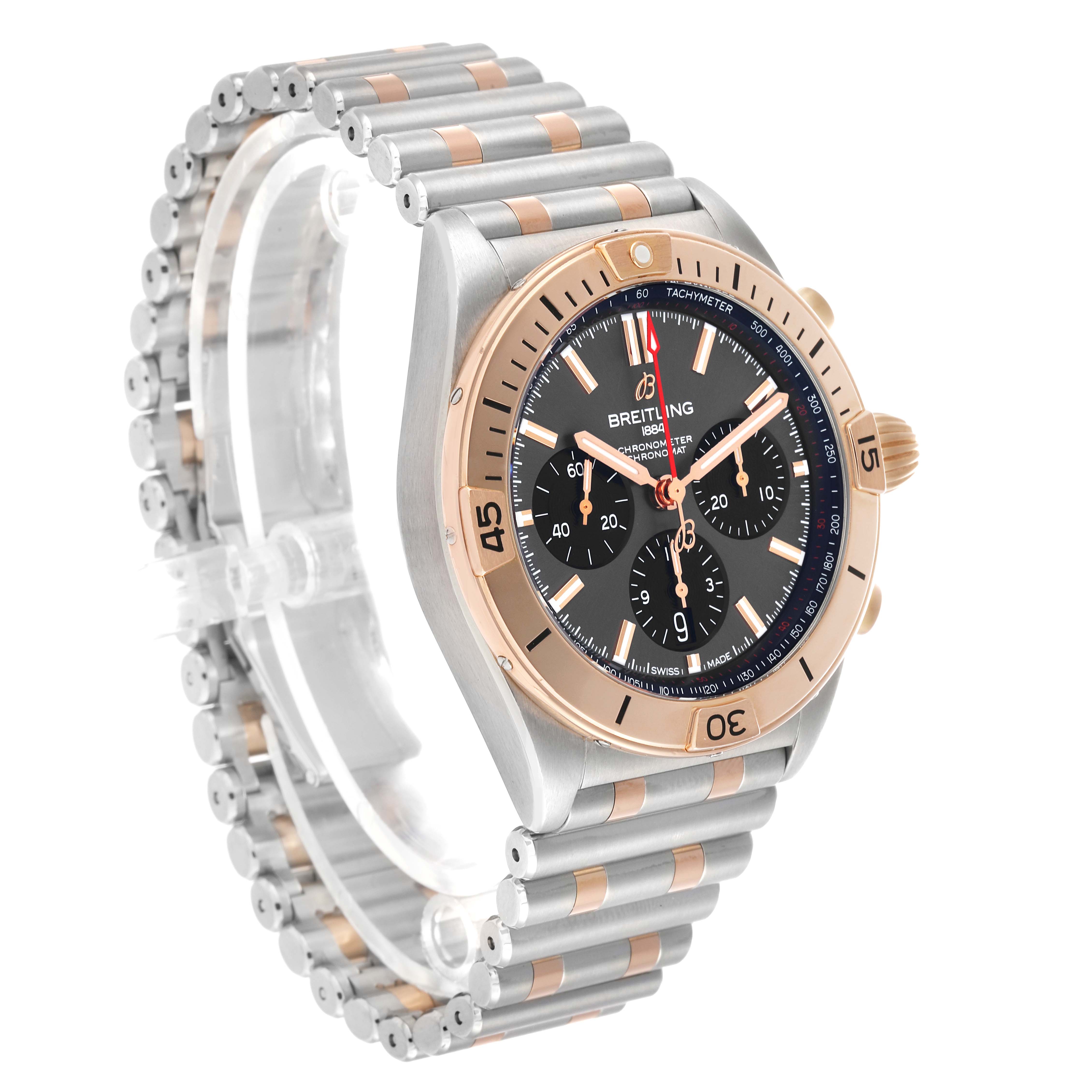 The Breitling Chronomat UB0134 Men's Steel and Gold (two tone) Grey Dial watch is shown at a three-quarter angle, highlighting the case, bezel, bracelet, and dial.