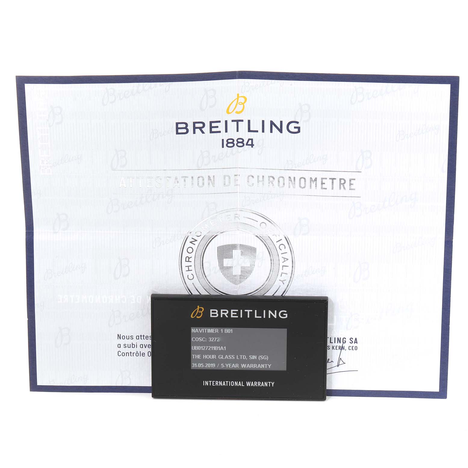The image shows the warranty card and certificate for a Breitling Navitimer UB0127 Men's Steel and Gold (two tone) Black Dial UB0127 Men's Steel and Gold (two tone) Black Dial watch.